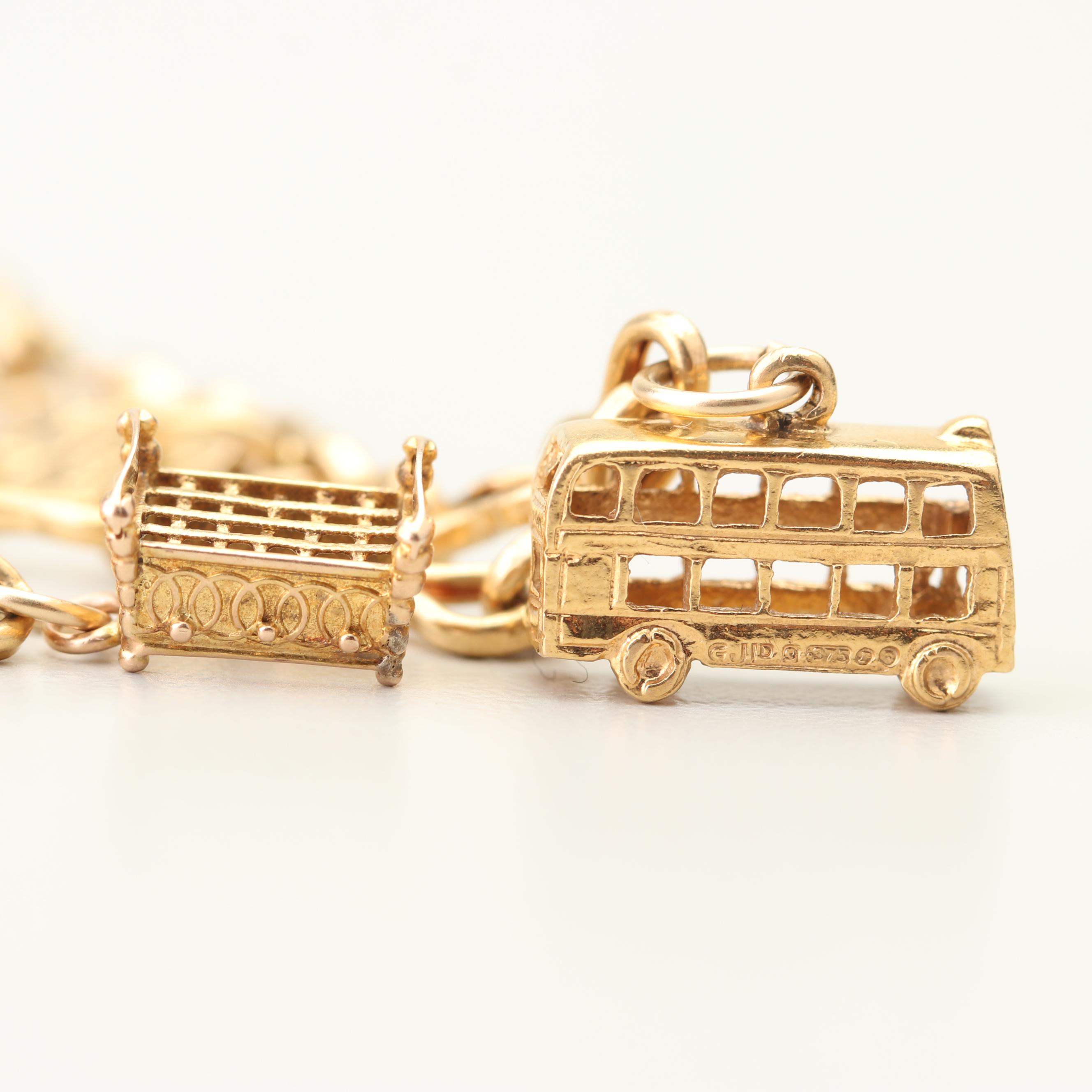18K Yellow Gold Charm Bracelet with 14K and 10K Yellow Gold Charms