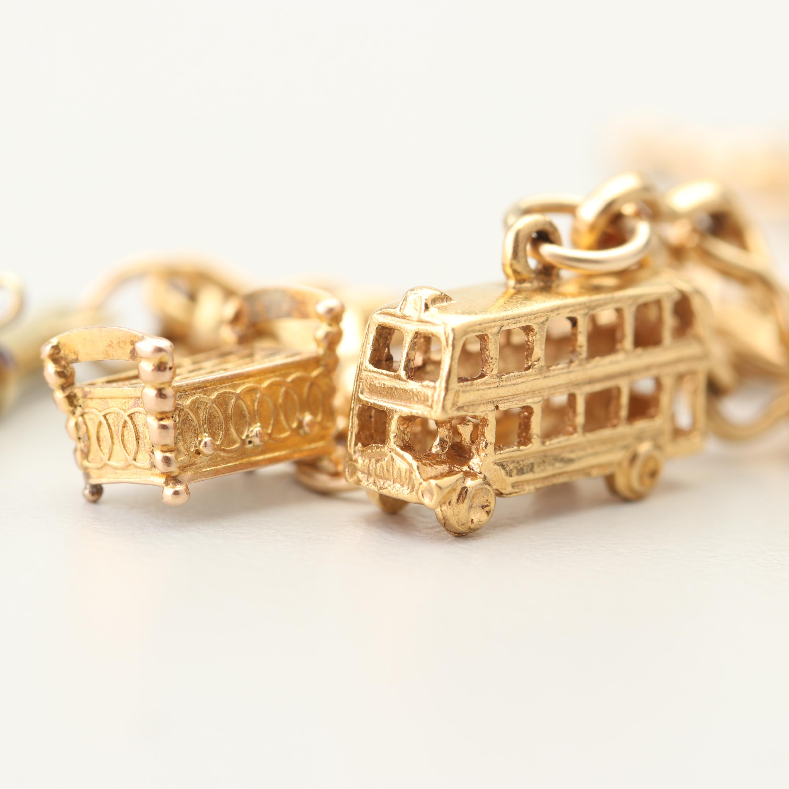 18K Yellow Gold Charm Bracelet with 14K and 10K Yellow Gold Charms