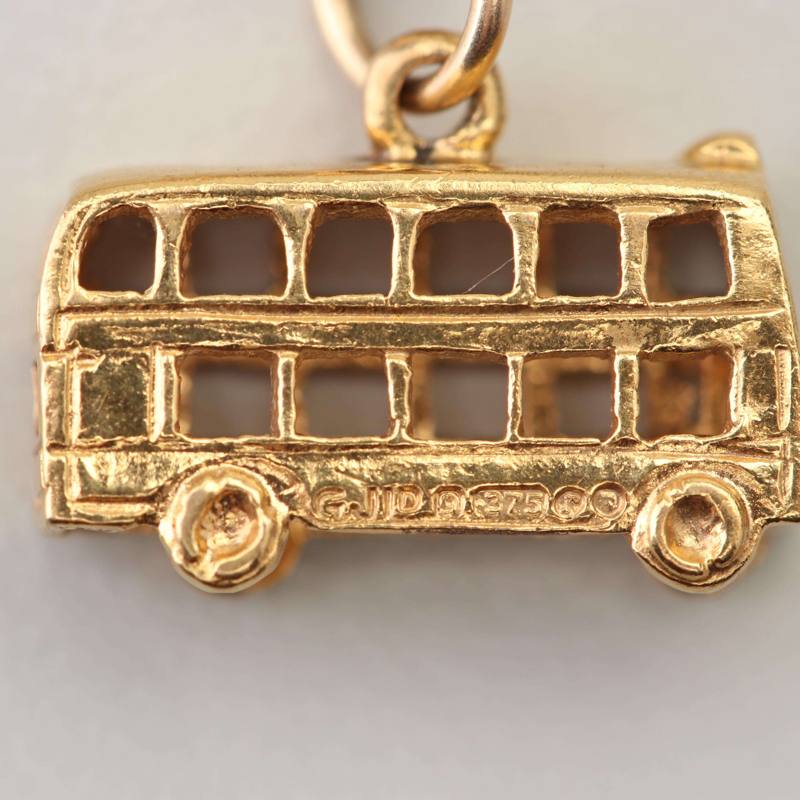 18K Yellow Gold Charm Bracelet with 14K and 10K Yellow Gold Charms