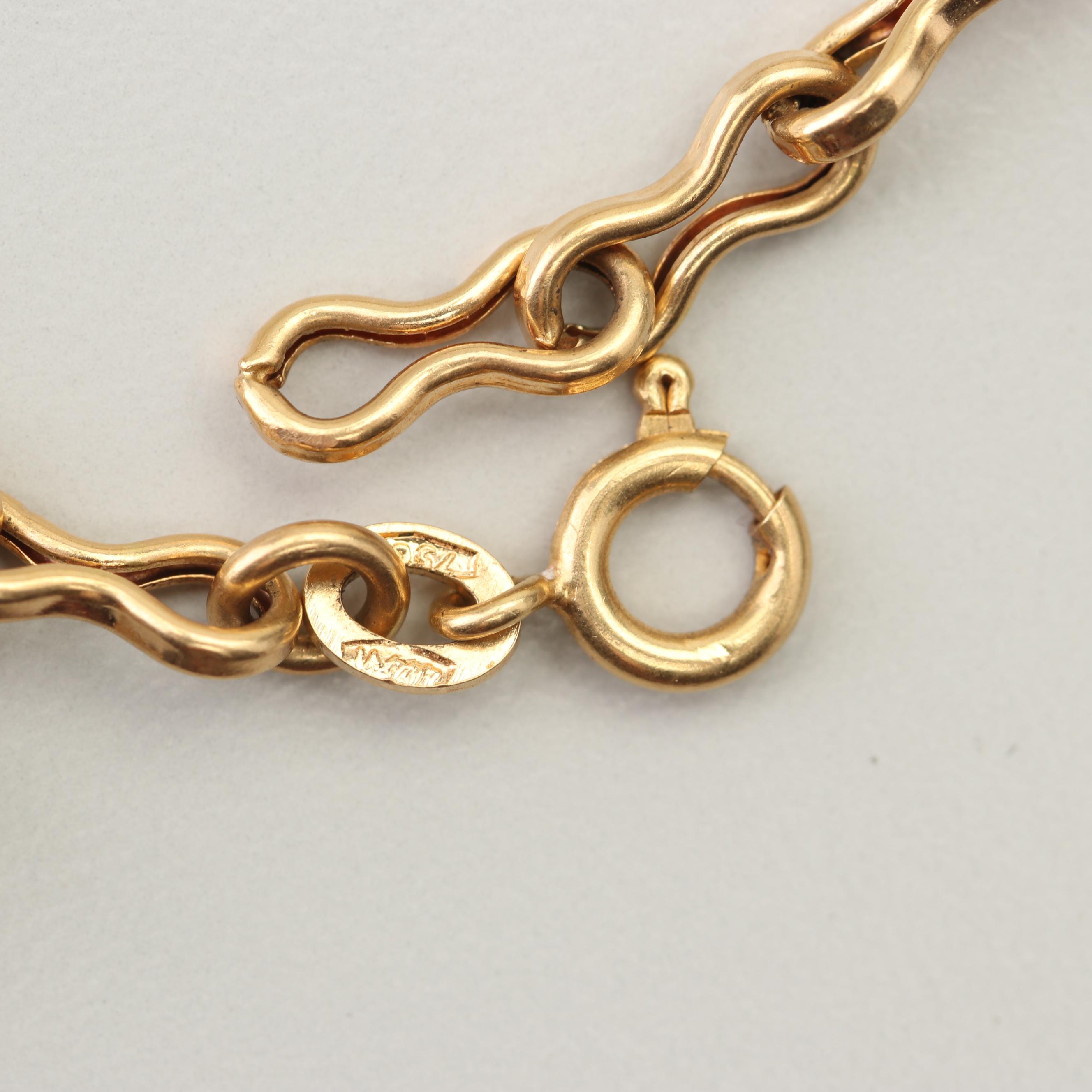 18K Yellow Gold Charm Bracelet with 14K and 10K Yellow Gold Charms