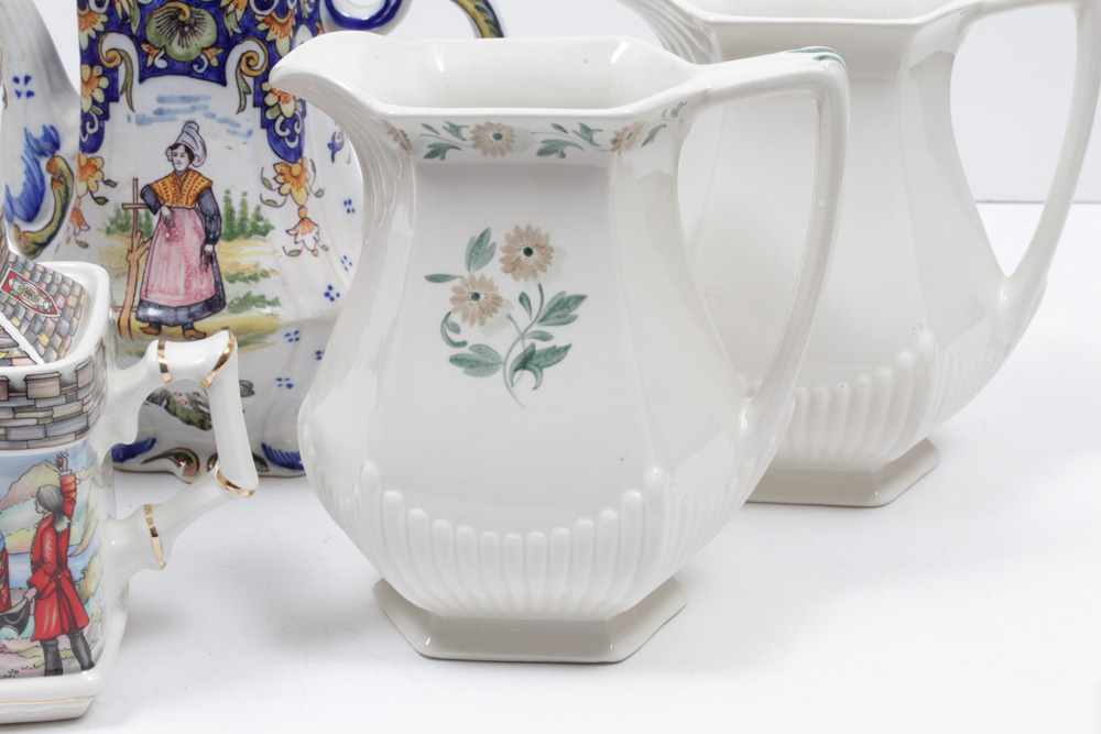 Teapots, Pitchers and Demitasse Cups with Matching Saucers