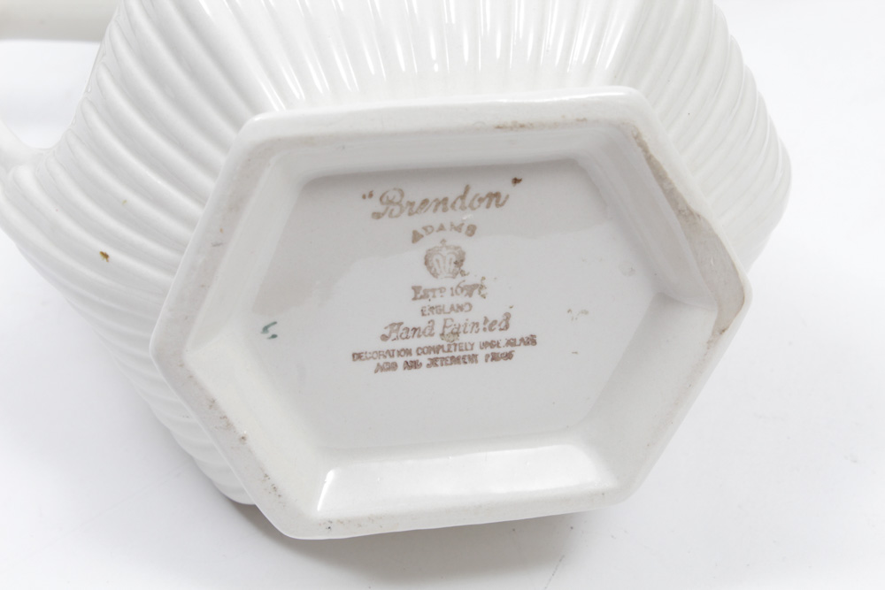 Teapots, Pitchers and Demitasse Cups with Matching Saucers