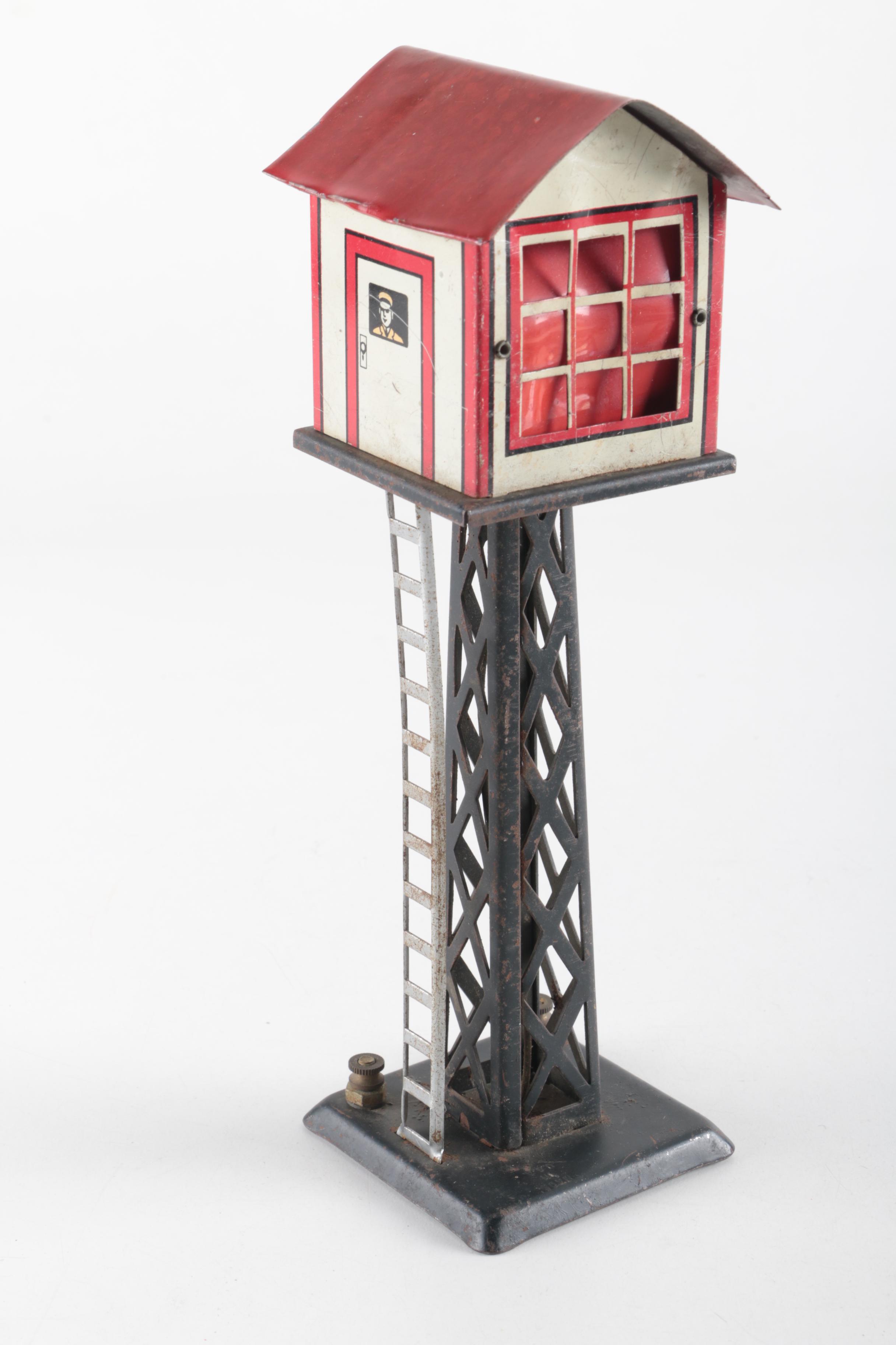 Three Vintage Marx Co. Toy Railroad Crossing Signs and Control Tower