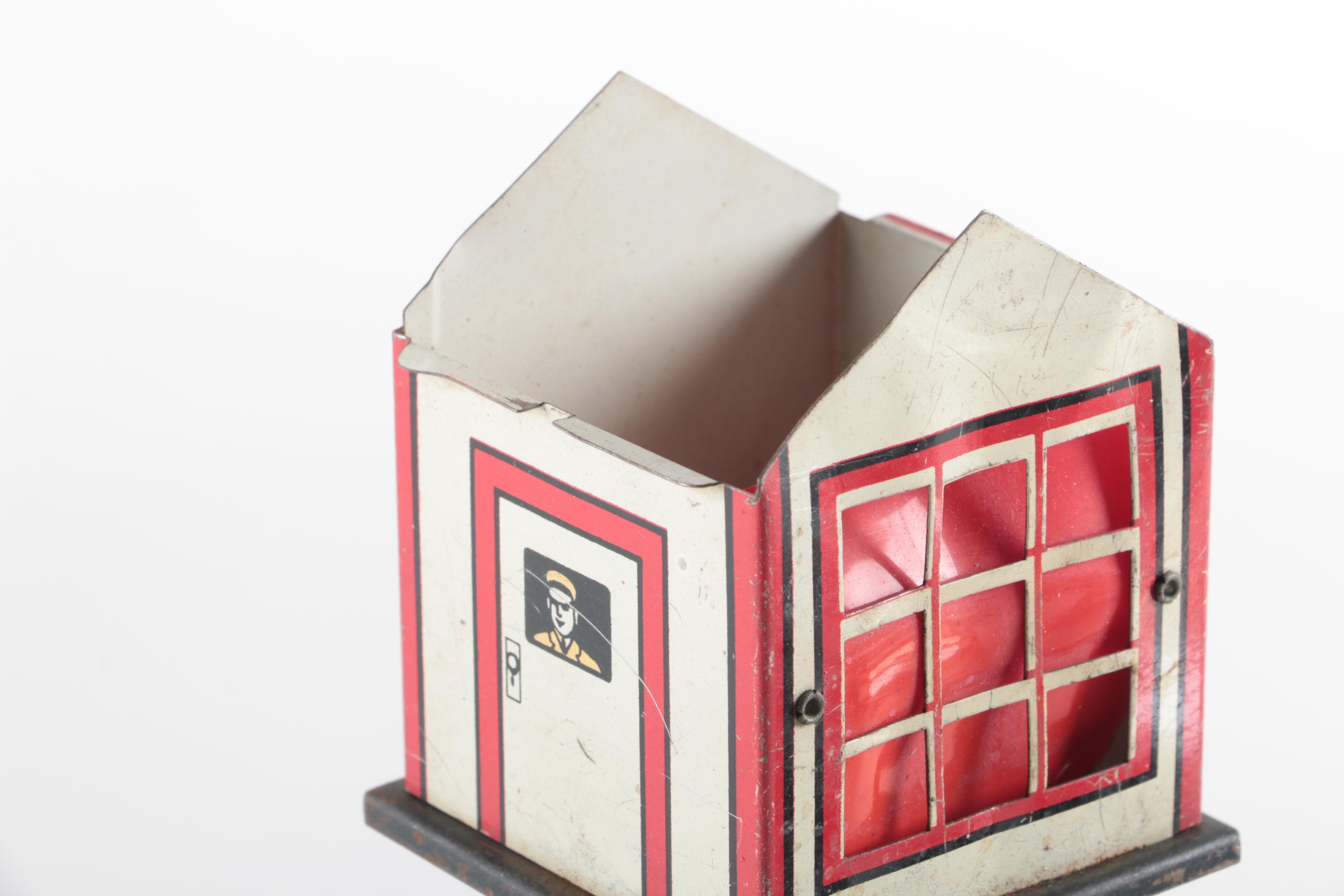 Three Vintage Marx Co. Toy Railroad Crossing Signs and Control Tower