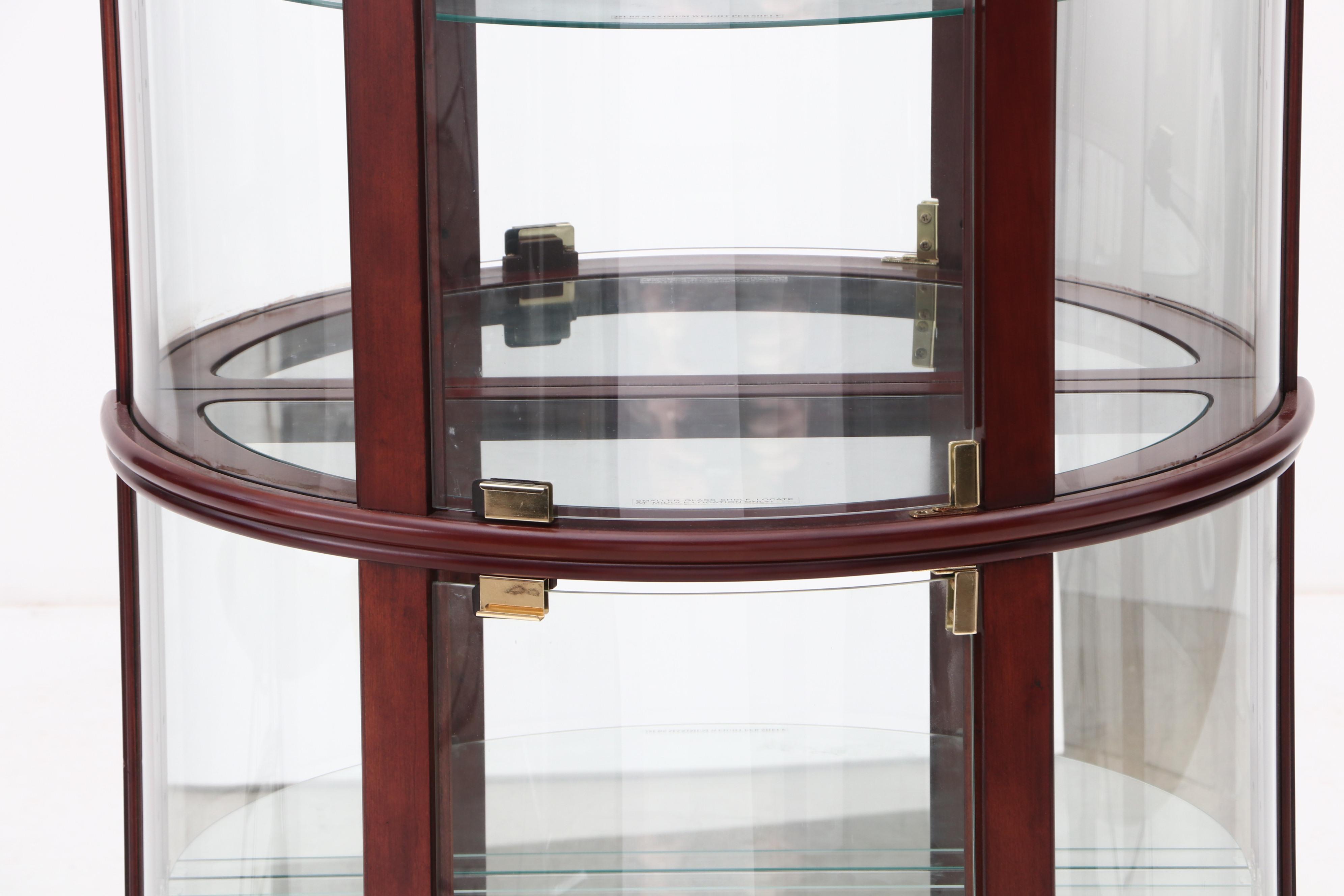 2013 Wood and Glass Illuminated Curio Cabinet by Home Meridian Furniture