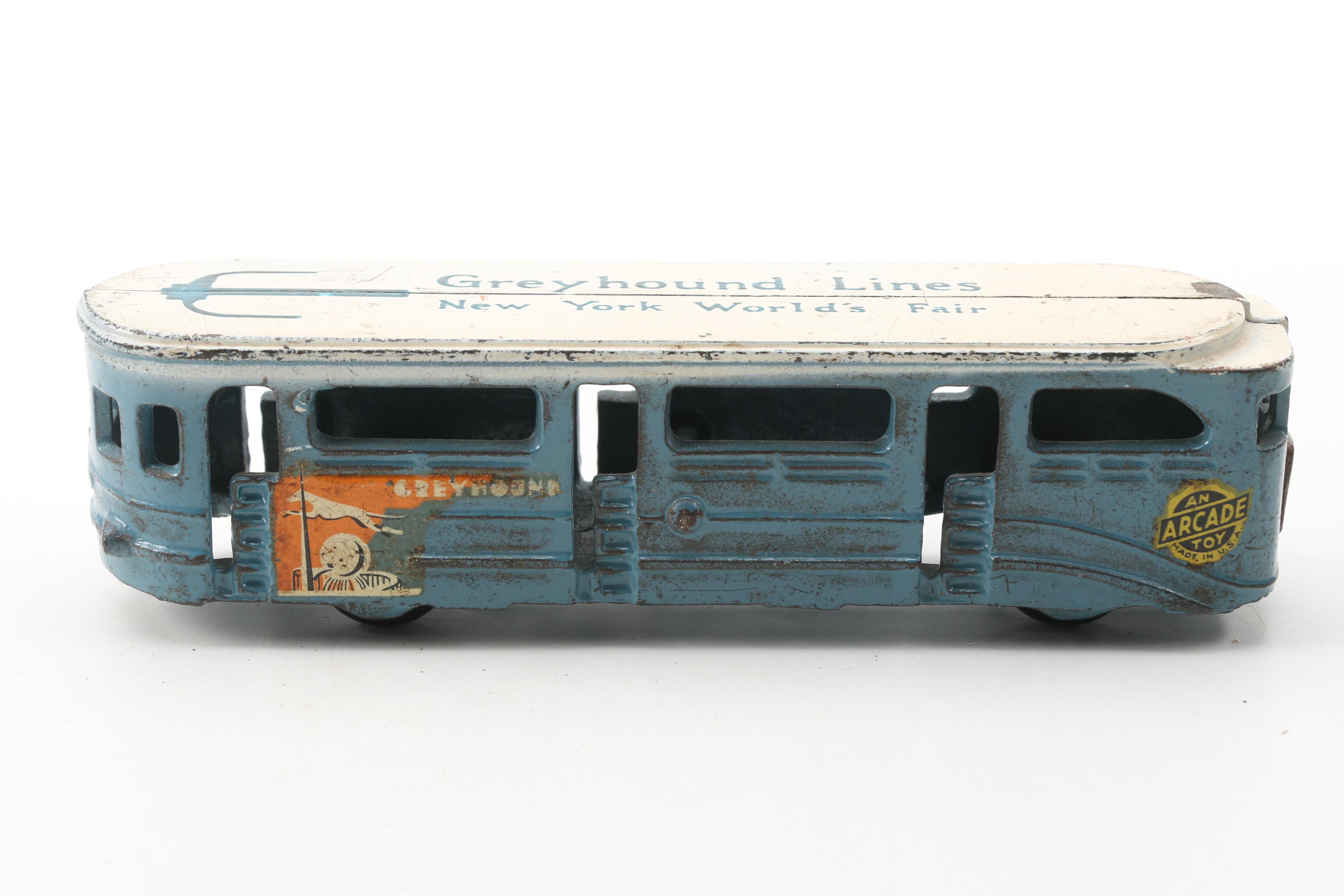 Arcade Mfg. Co. World's Fair Cast Iron GMC Greyhound Lines Bus and Tram Car