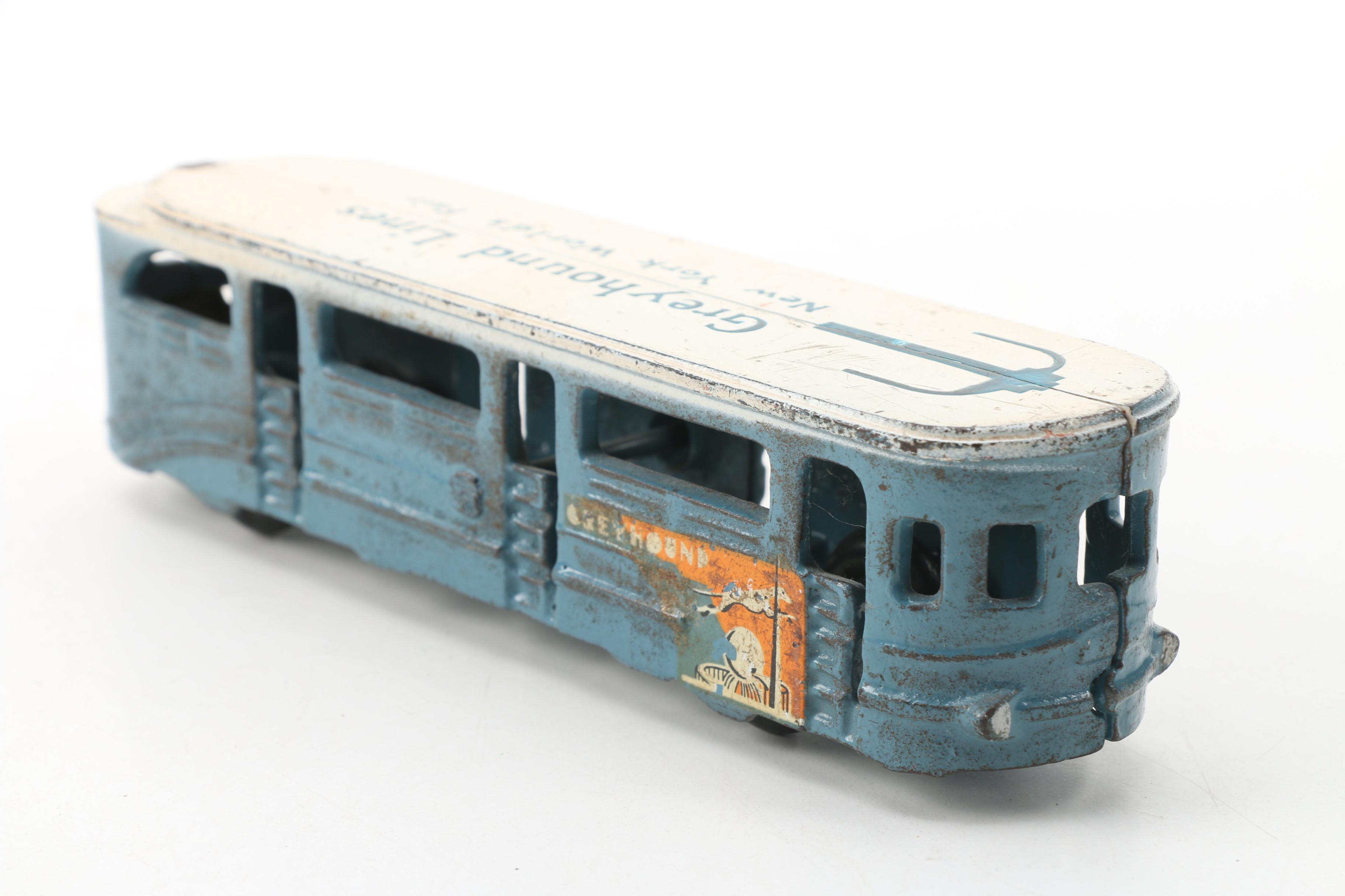 Arcade Mfg. Co. World's Fair Cast Iron GMC Greyhound Lines Bus and Tram Car