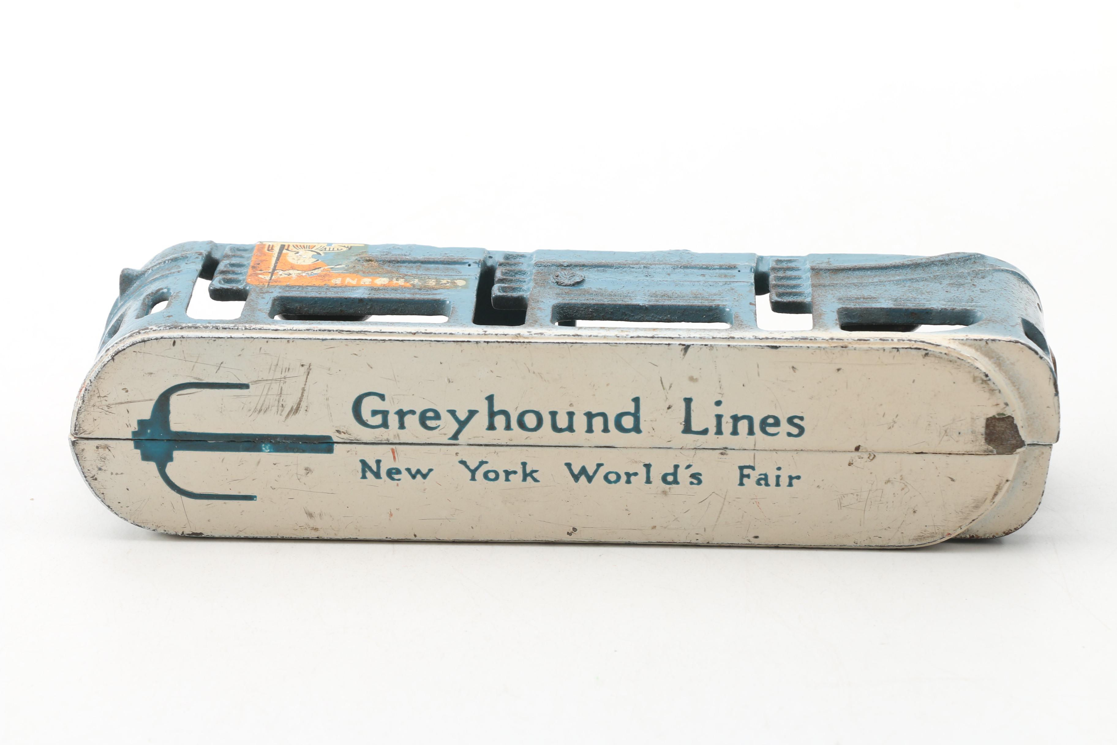 Arcade Mfg. Co. World's Fair Cast Iron GMC Greyhound Lines Bus and Tram Car
