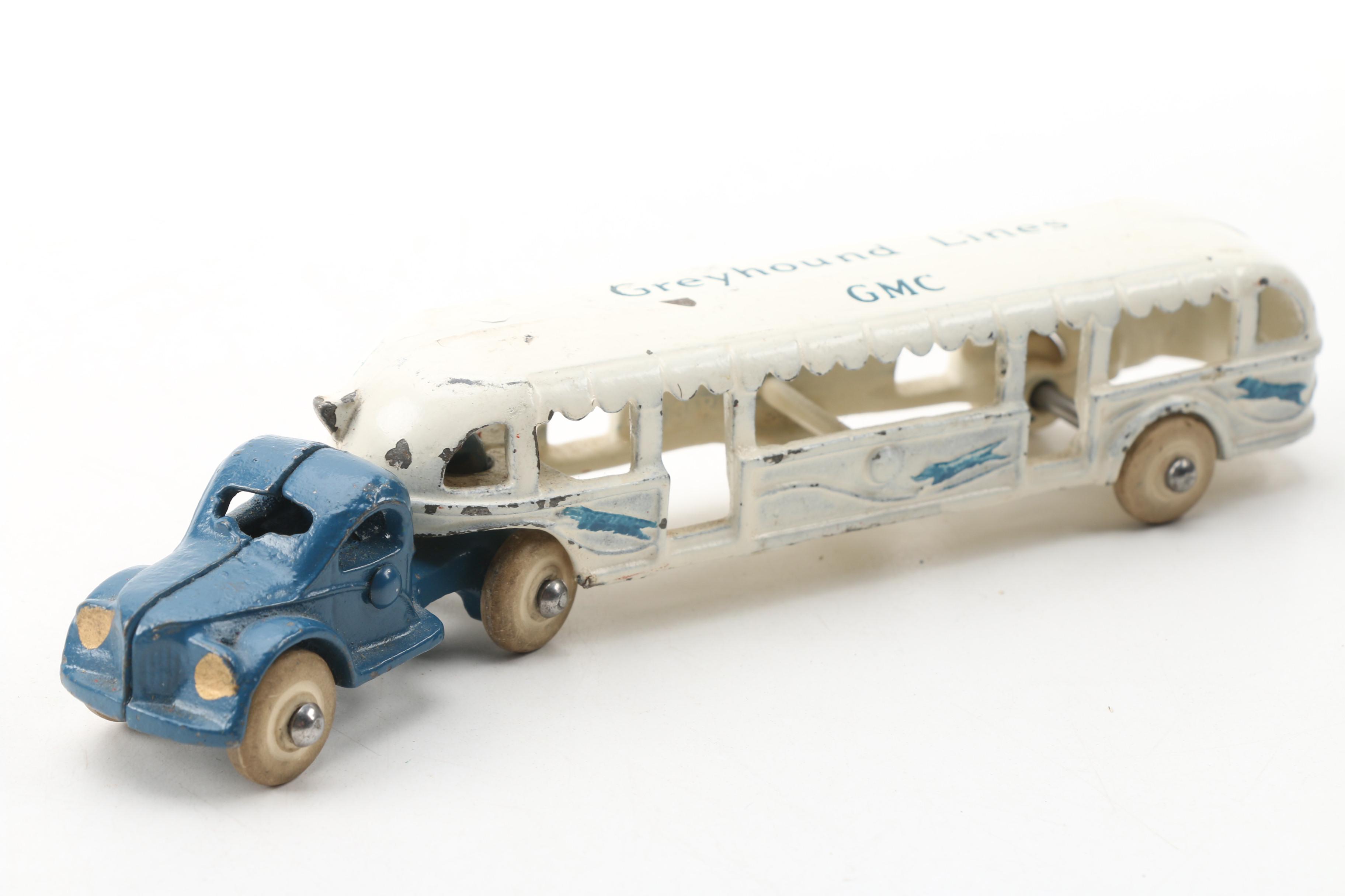 Arcade Mfg. Co. World's Fair Cast Iron GMC Greyhound Lines Bus and Tram Car