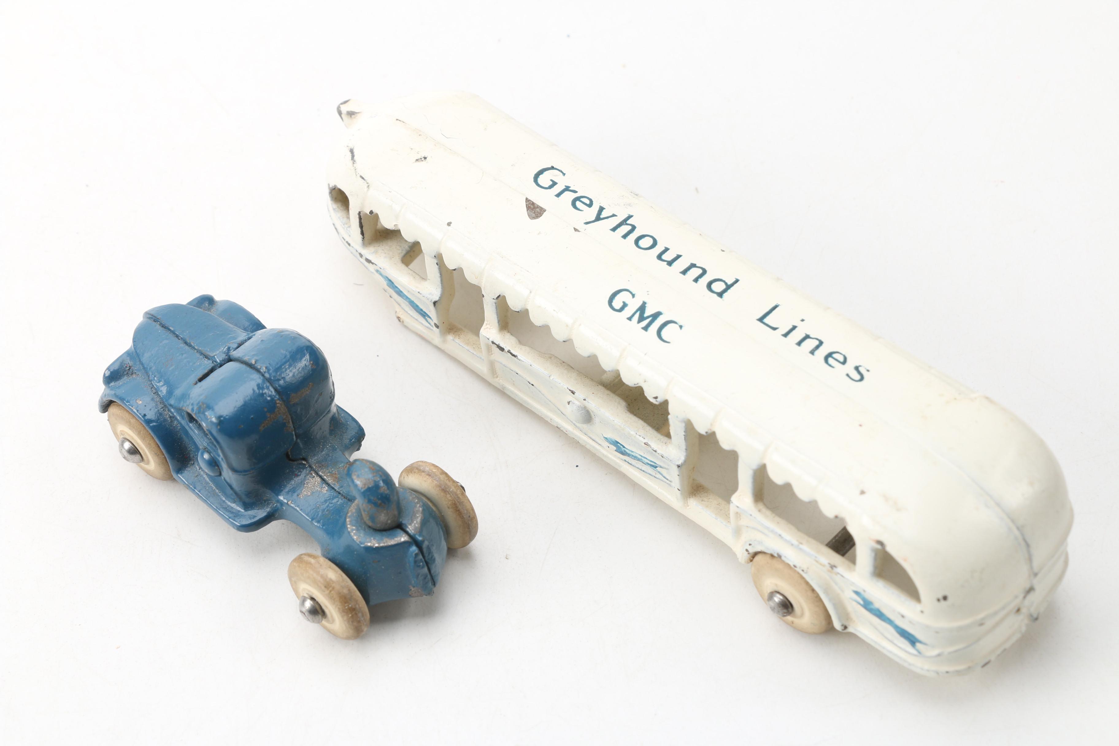 Arcade Mfg. Co. World's Fair Cast Iron GMC Greyhound Lines Bus and Tram Car