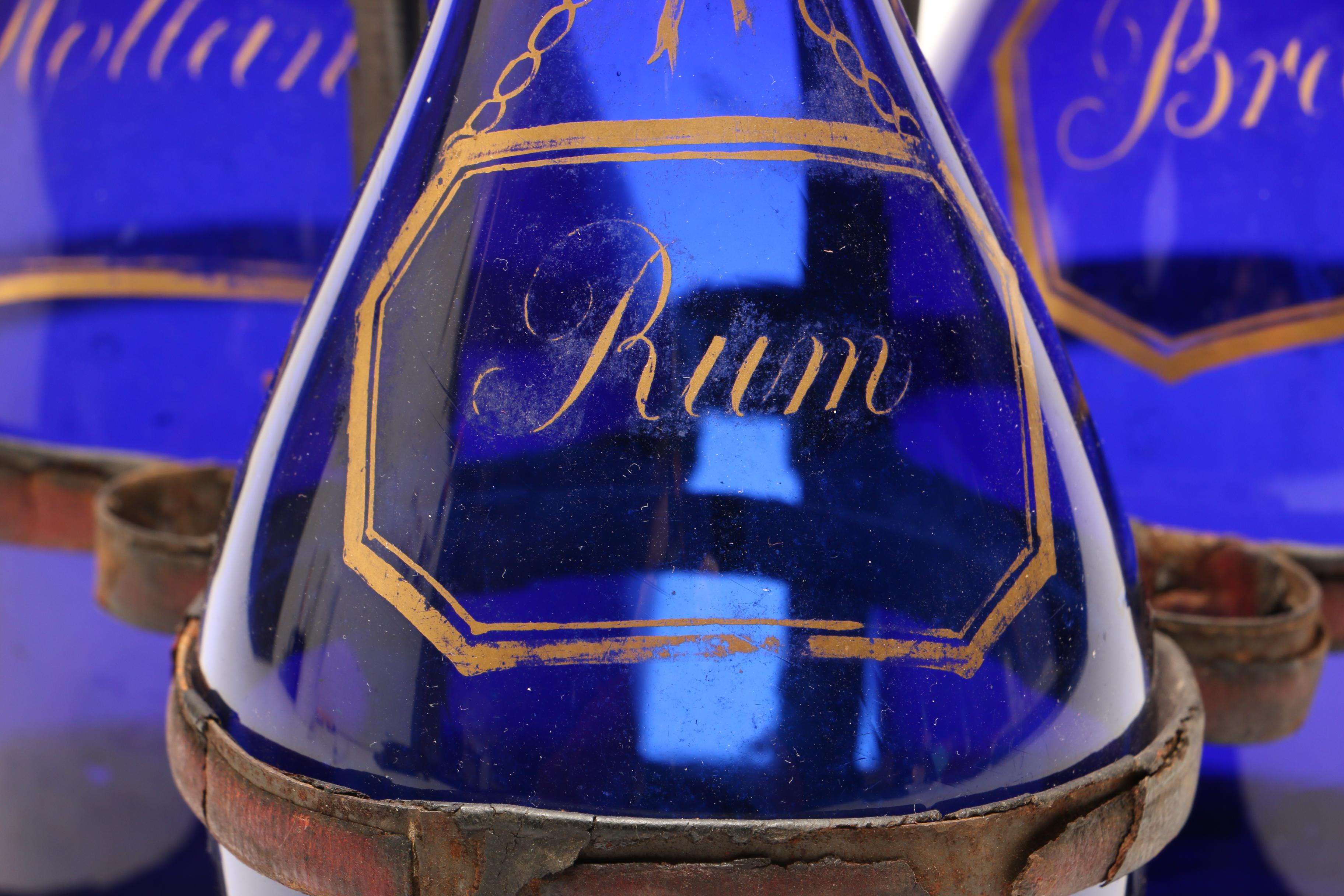 George III Bristol Blue Glass Decanter Set in Leather Stand, circa 1790-1800