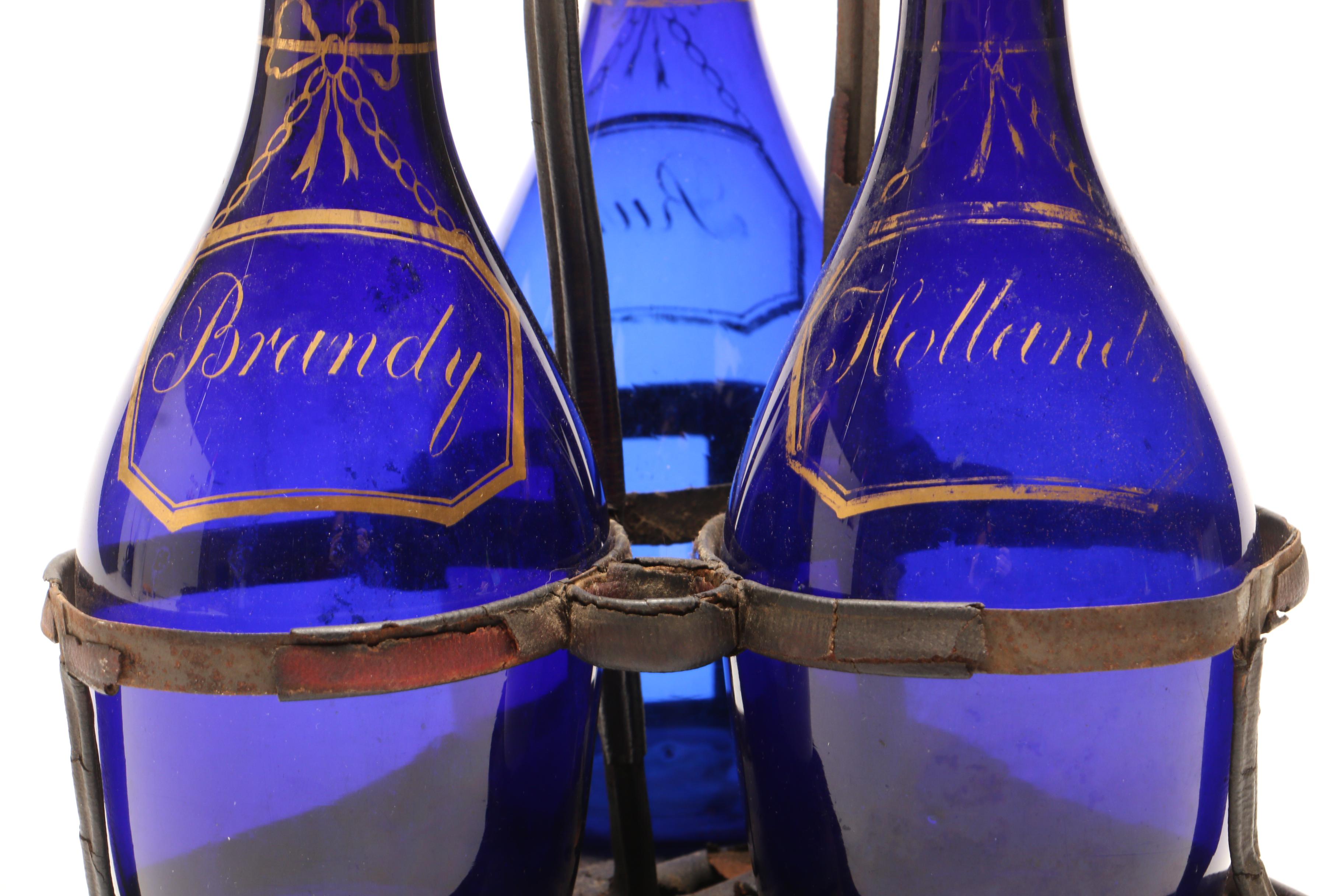 George III Bristol Blue Glass Decanter Set in Leather Stand, circa 1790-1800
