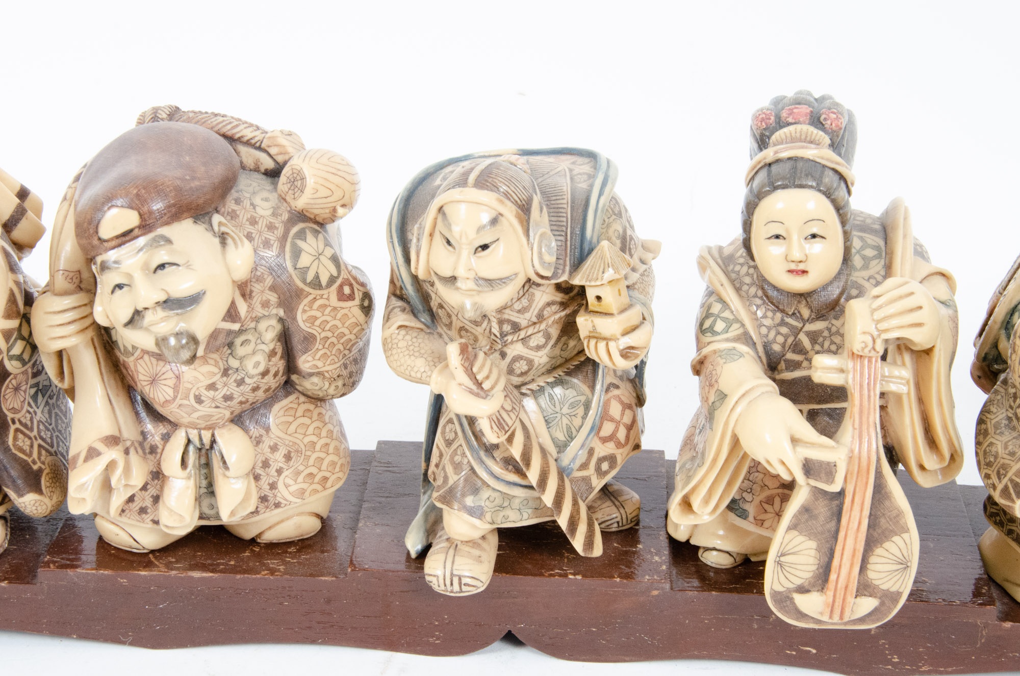 Japanese Style "Seven Lucky Gods" Figurines with Wooden Display Stand