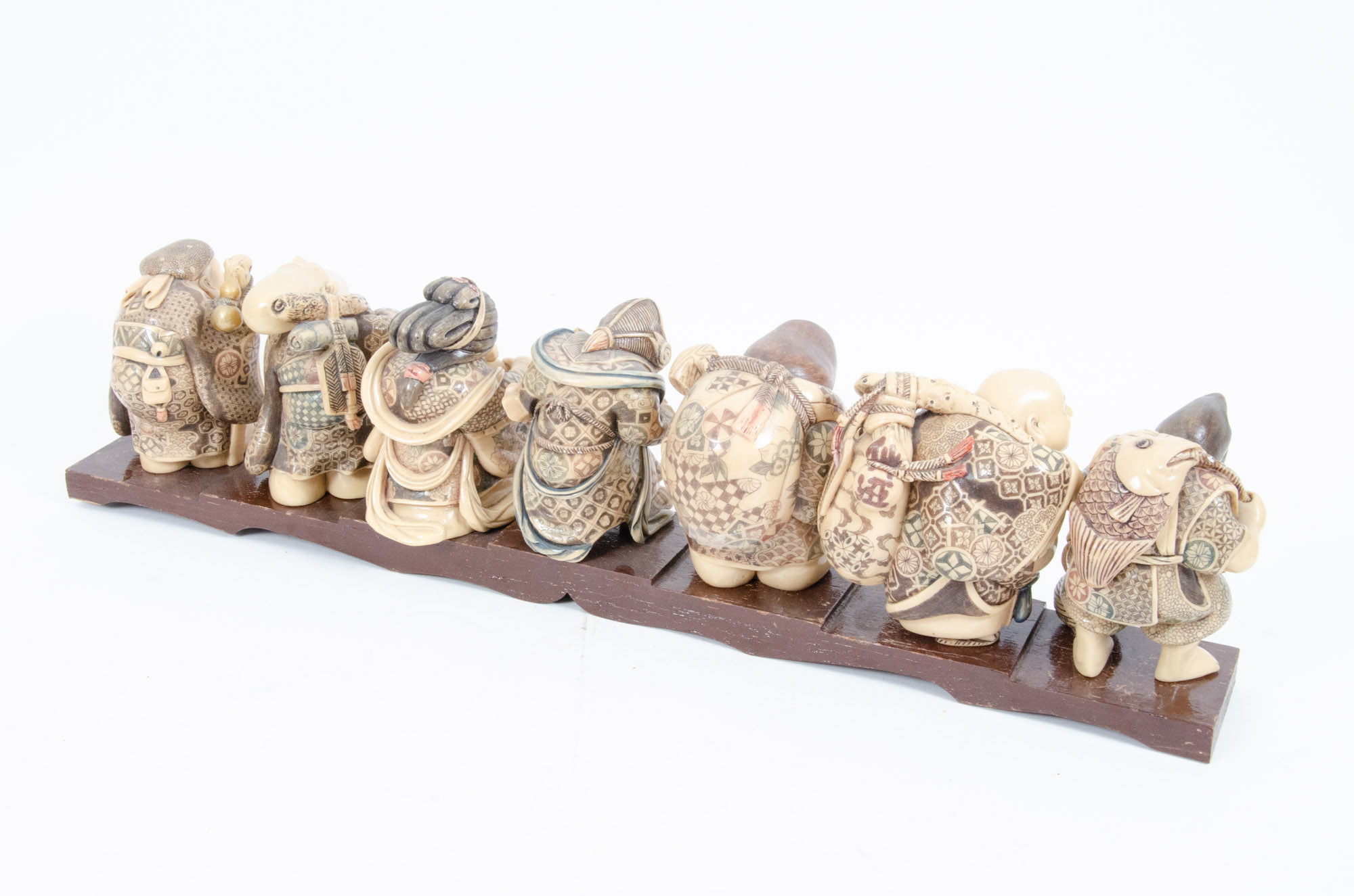 Japanese Style "Seven Lucky Gods" Figurines with Wooden Display Stand