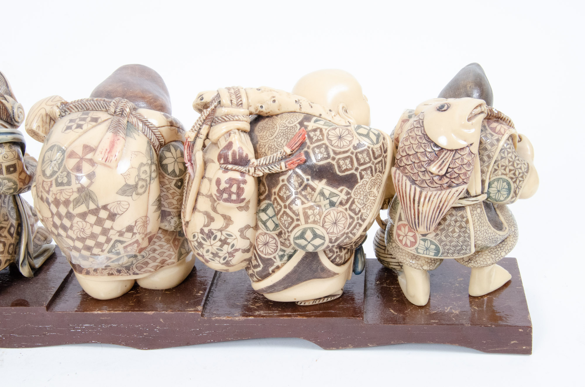 Japanese Style "Seven Lucky Gods" Figurines with Wooden Display Stand
