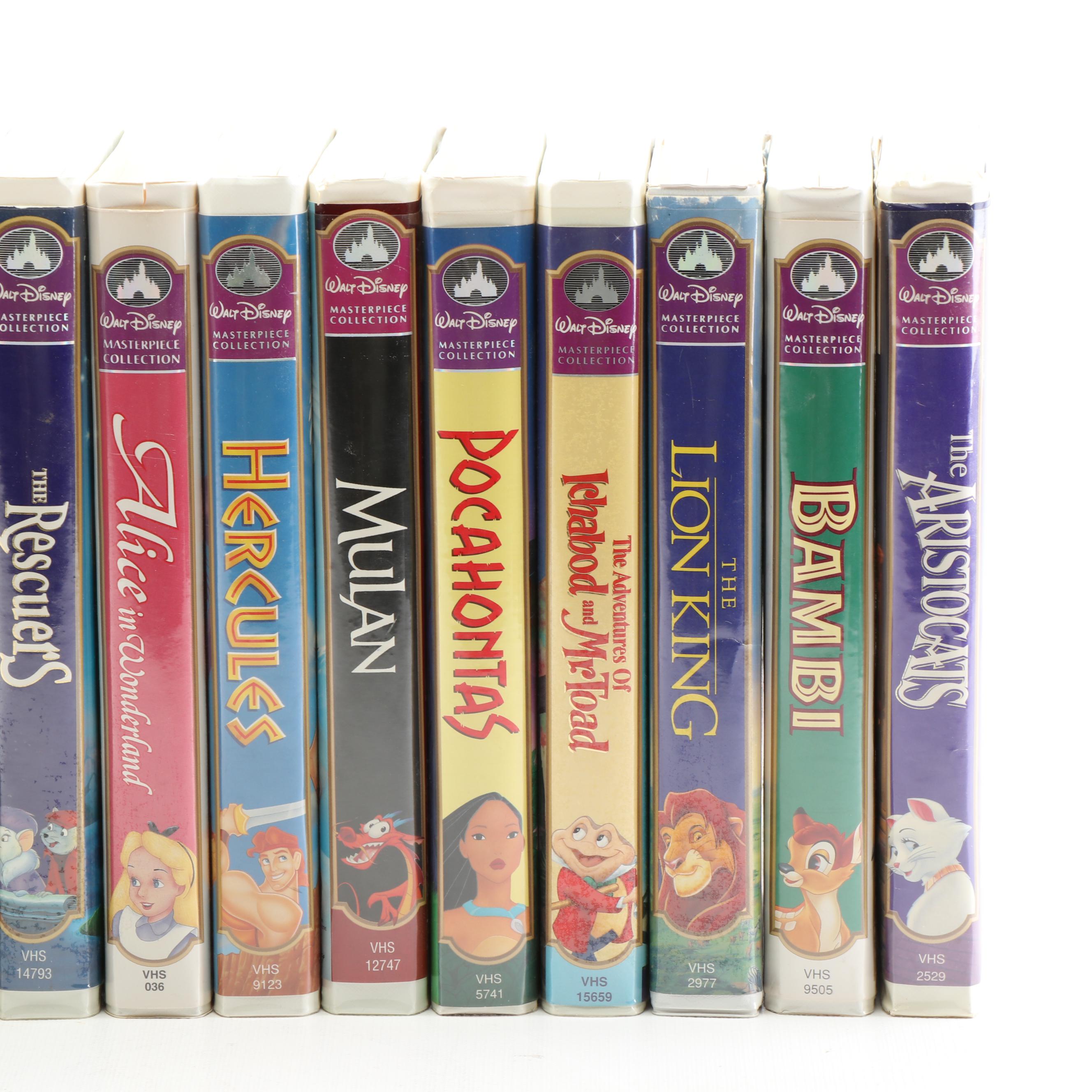 Disney VHS Tapes including "Fox and the Hound" and "Alice in Wonderland"