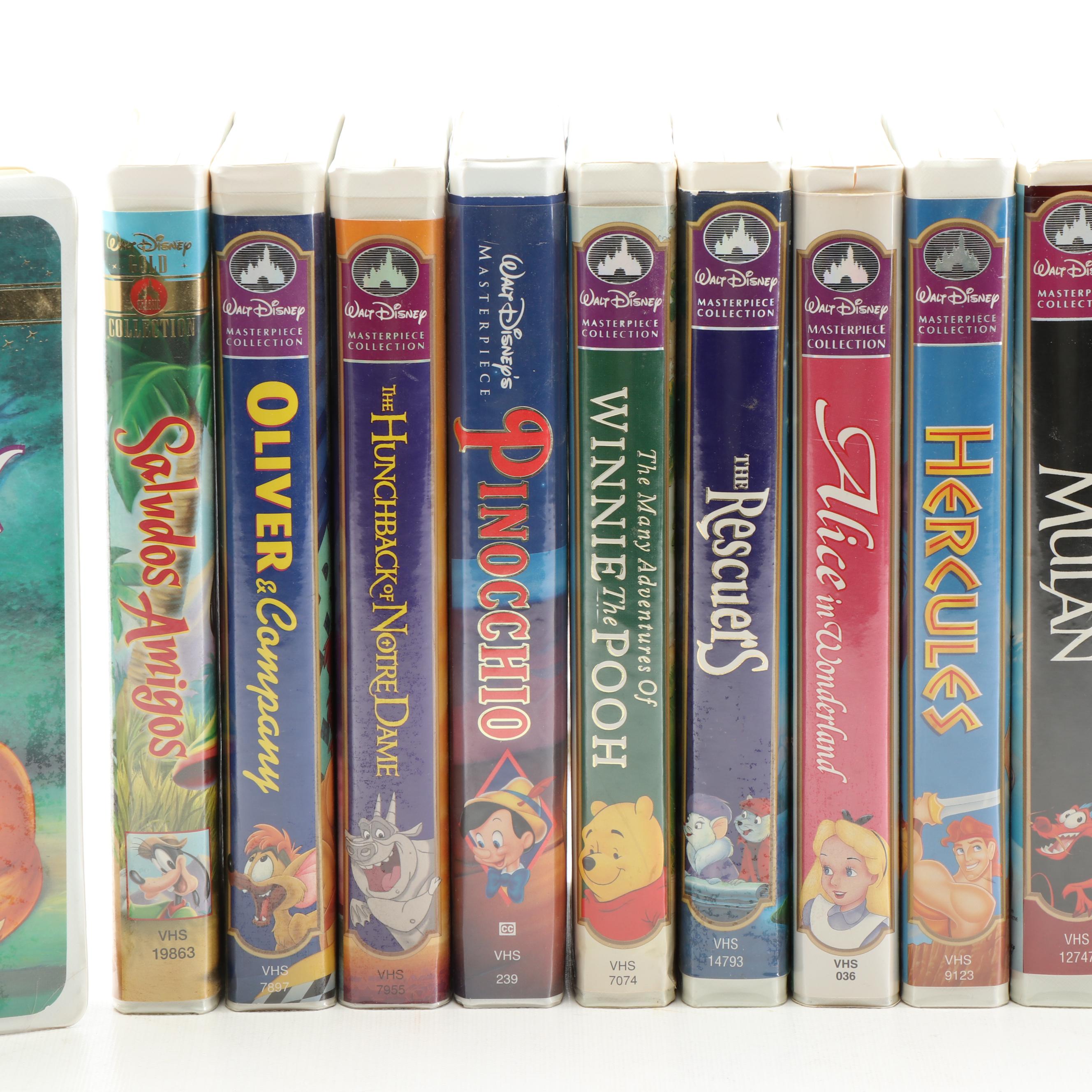 Disney VHS Tapes including "Fox and the Hound" and "Alice in Wonderland"