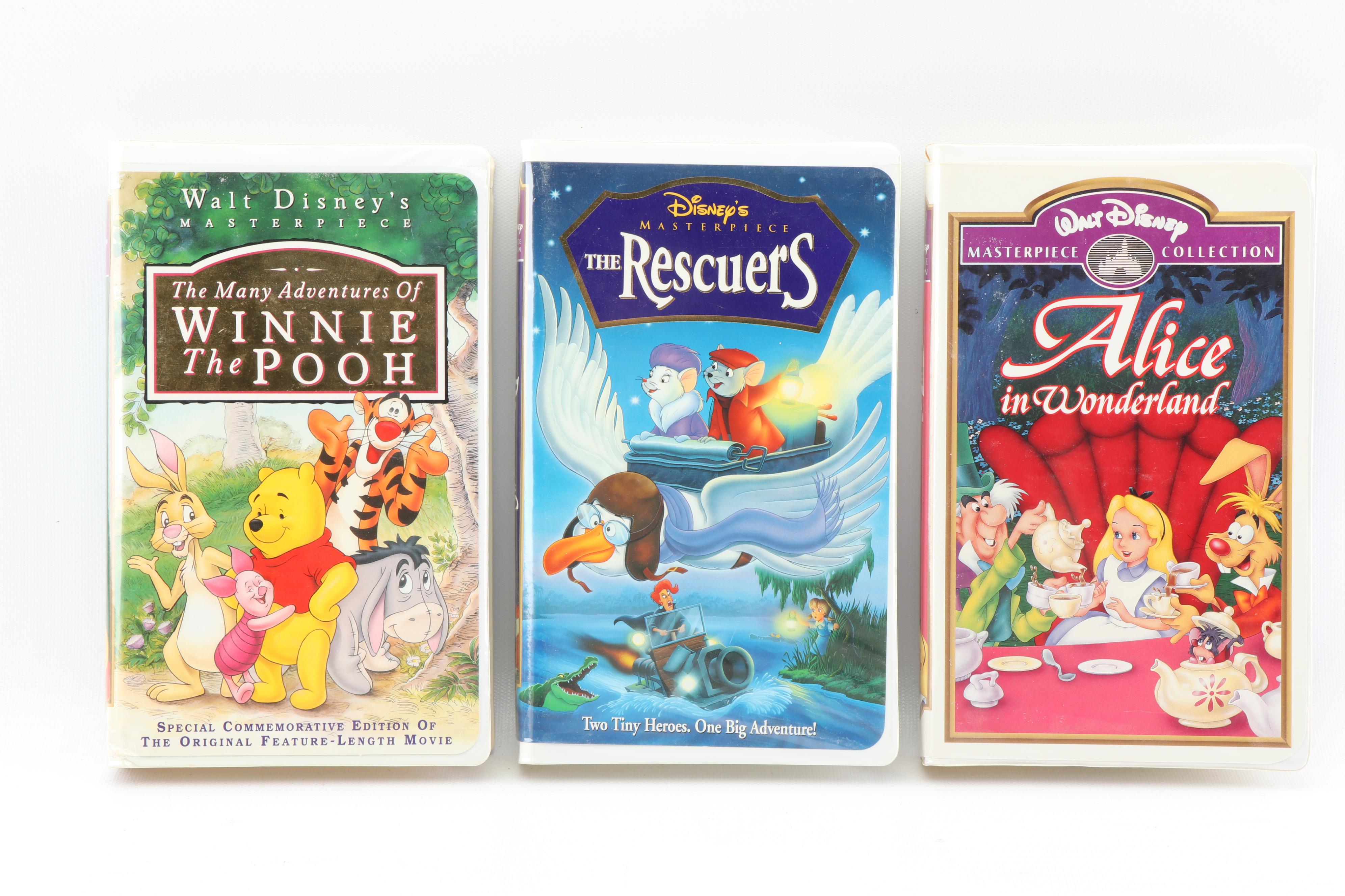 Disney VHS Tapes including "Fox and the Hound" and "Alice in Wonderland"