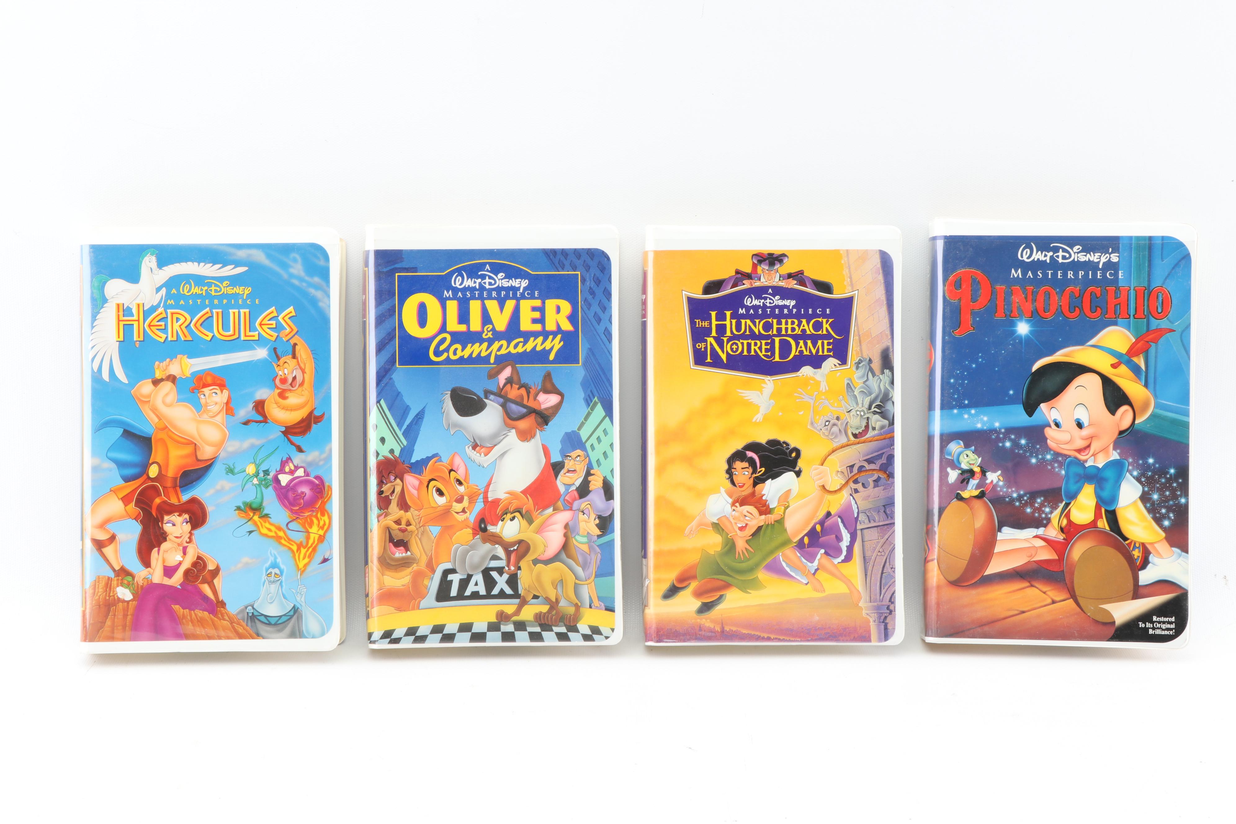 Disney VHS Tapes including "Fox and the Hound" and "Alice in Wonderland"