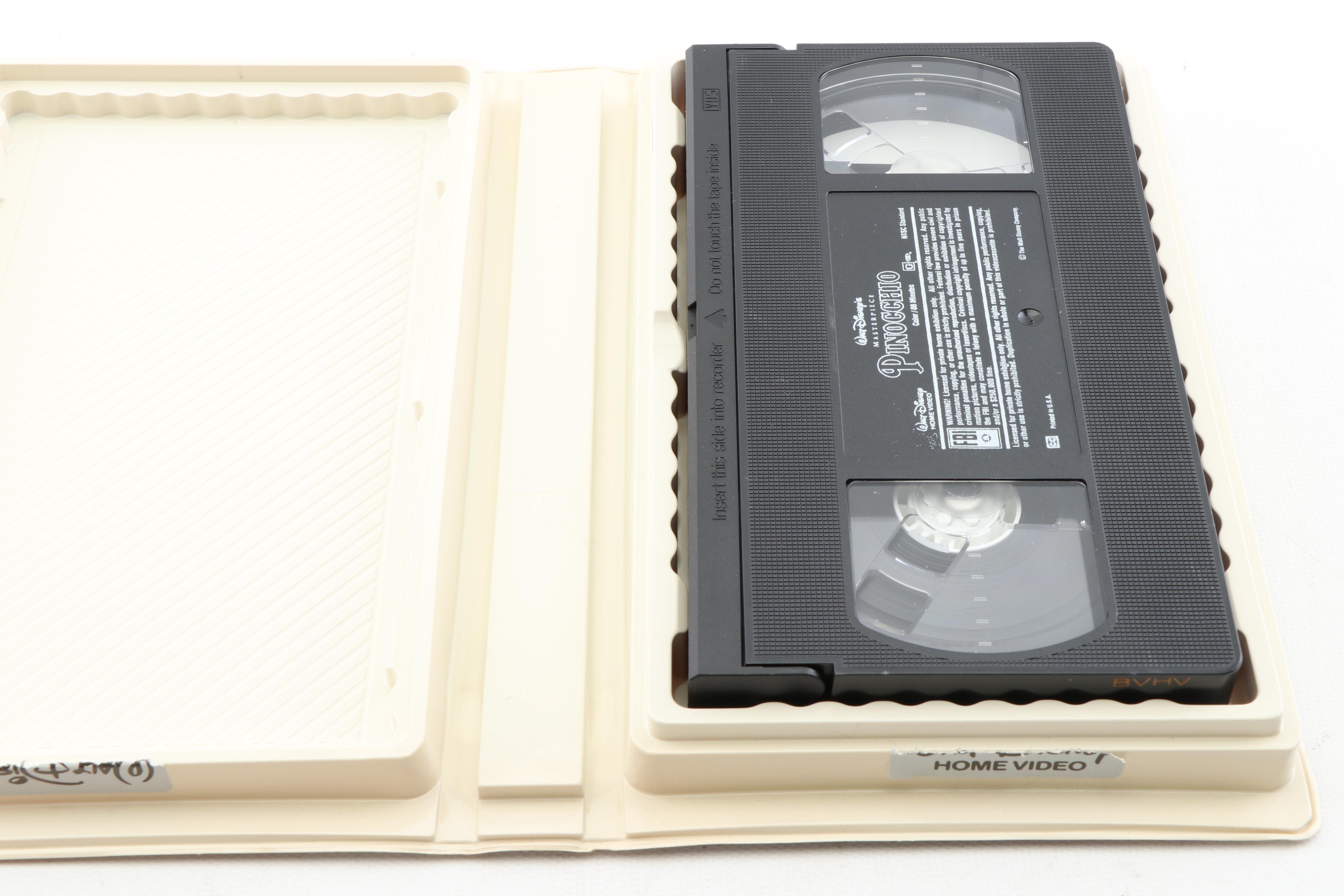 Disney VHS Tapes including "Fox and the Hound" and "Alice in Wonderland"