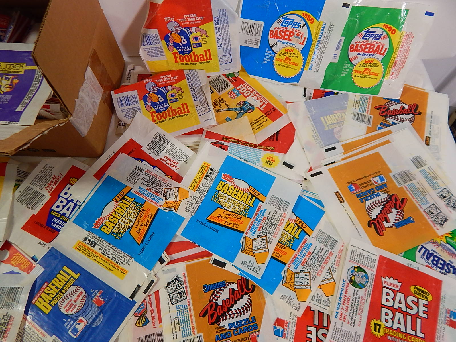 Hundreds of Wax Pack Wrappers with Sports and Non-Sports from 1980s