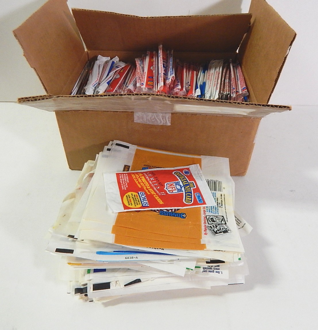 Hundreds of Wax Pack Wrappers with Sports and Non-Sports from 1980s