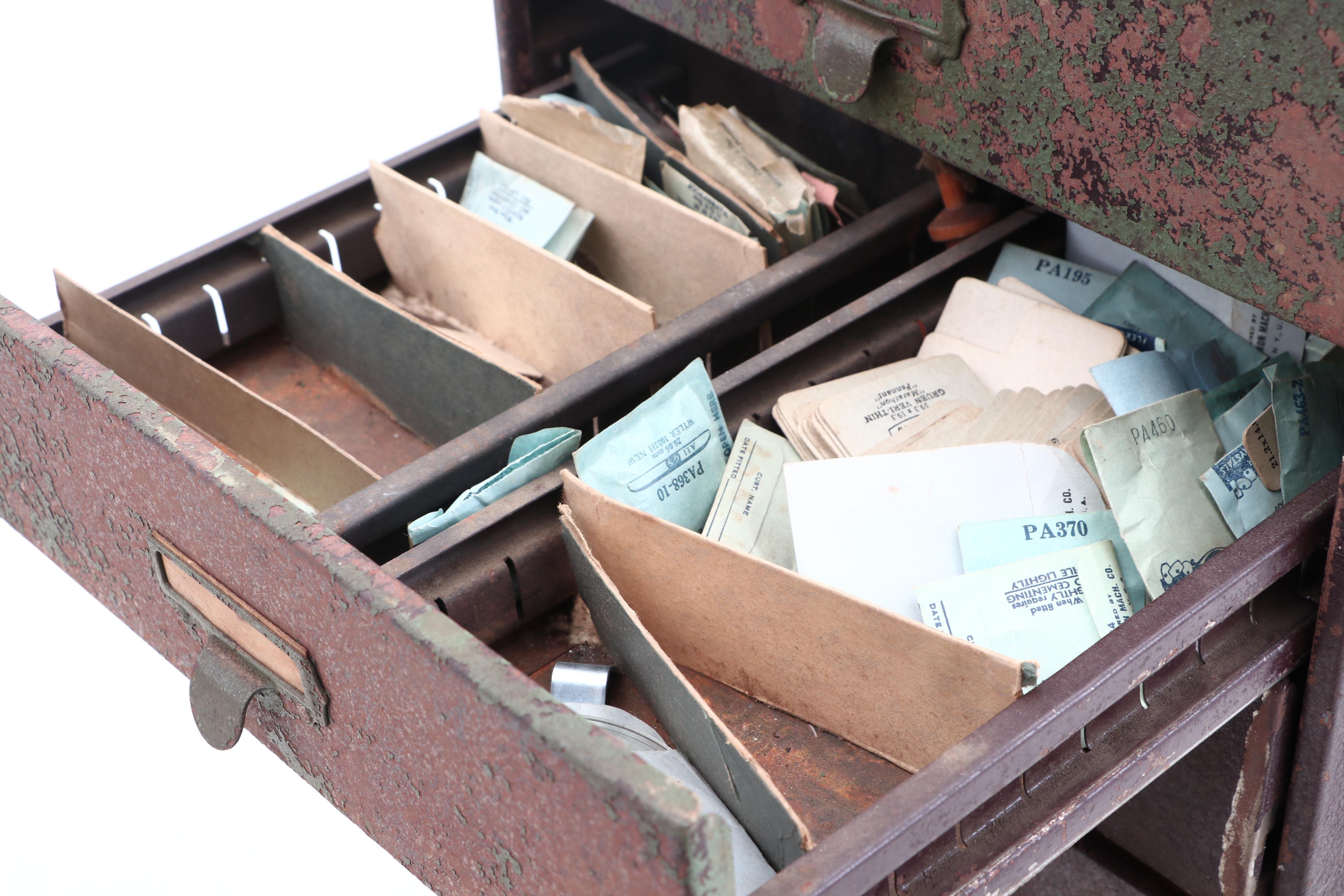 Watchmaker's Cabinet with Watch Crystals by Germanow-Simon Co.