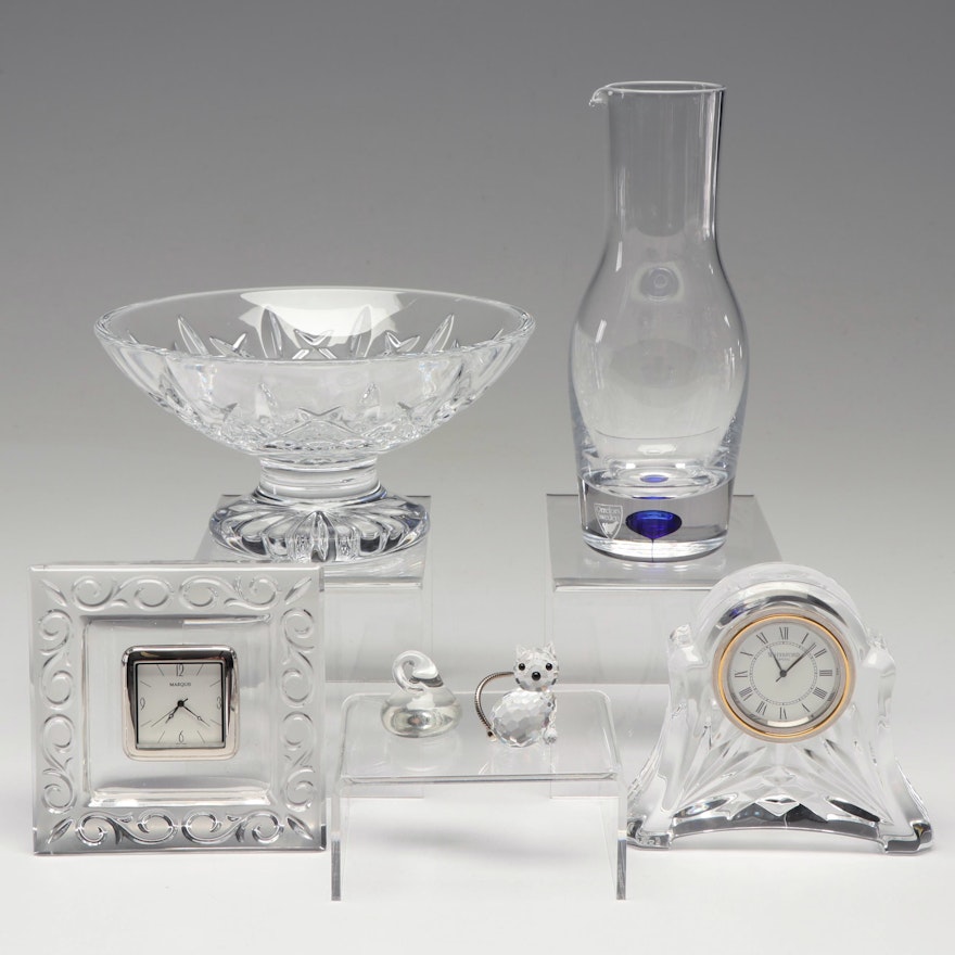 Crystal Figurines and Clocks Featuring Waterford, Swarovski and Orrefors