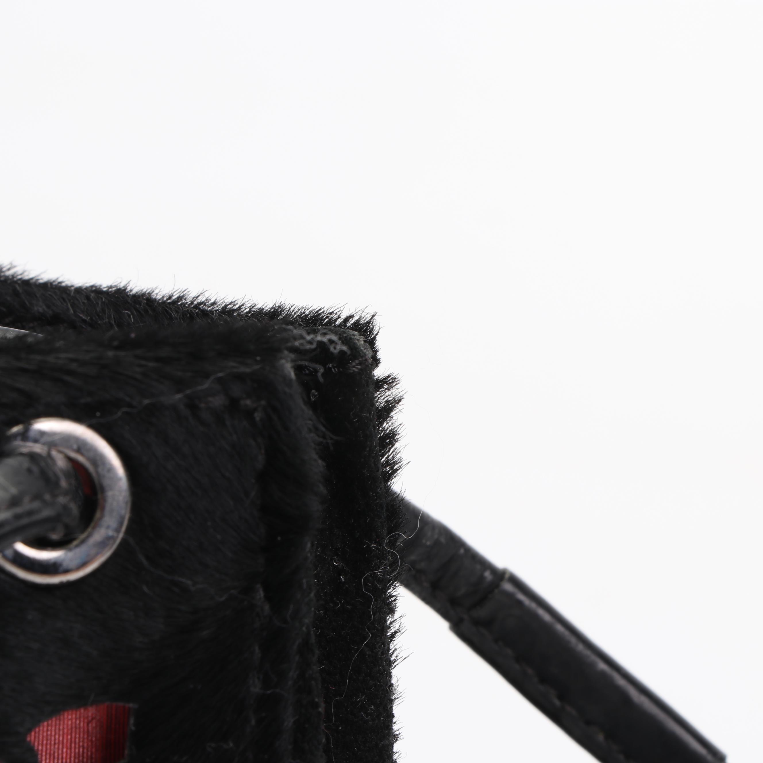 Longchamp Dyed Calf Hair Crossbody and Tory Burch Leather Foldover Crossbody Bag