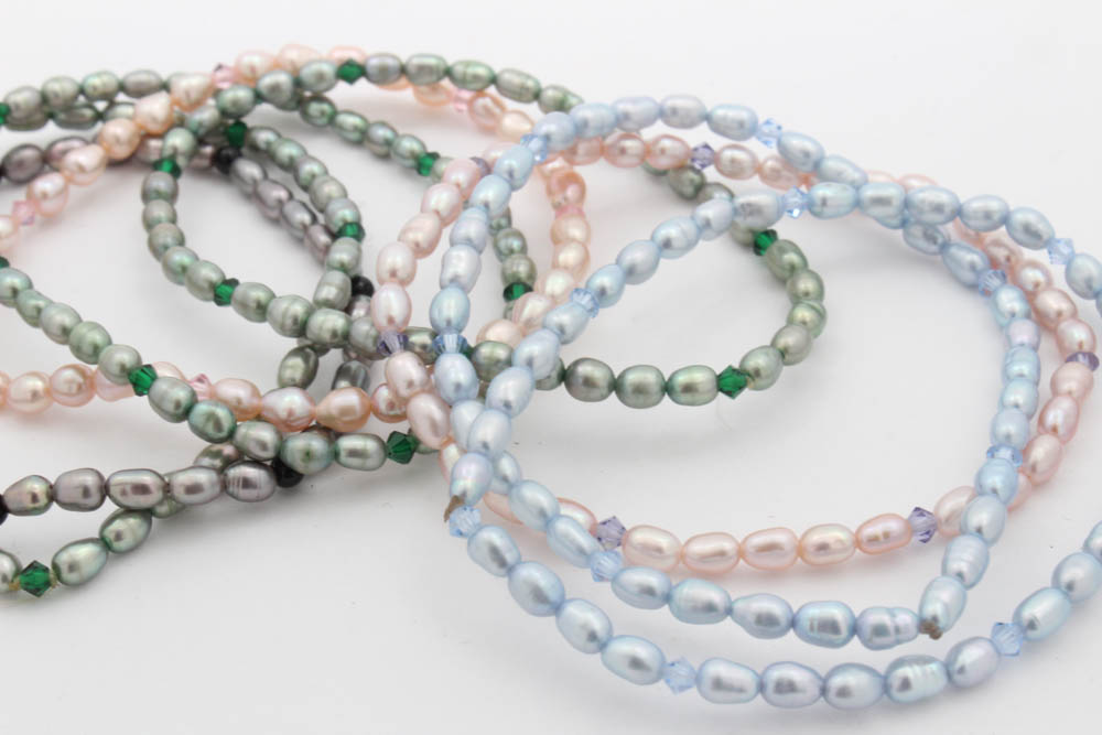 Eight Cultured Pearl Onyx and Glass Beaded Bracelets