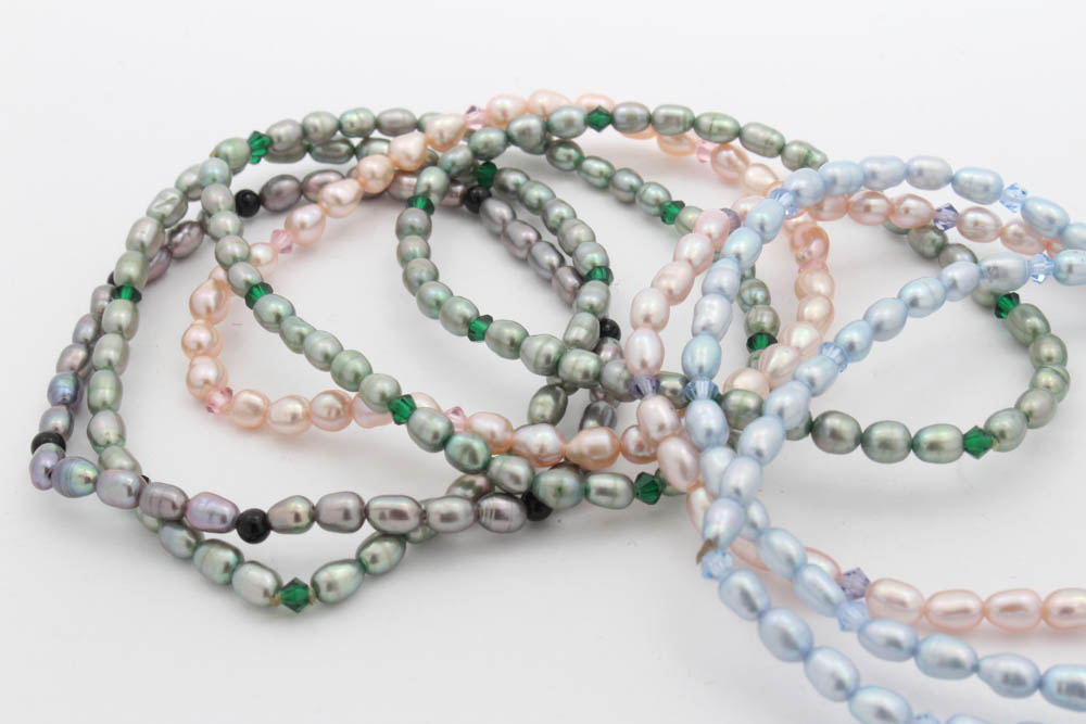 Eight Cultured Pearl Onyx and Glass Beaded Bracelets