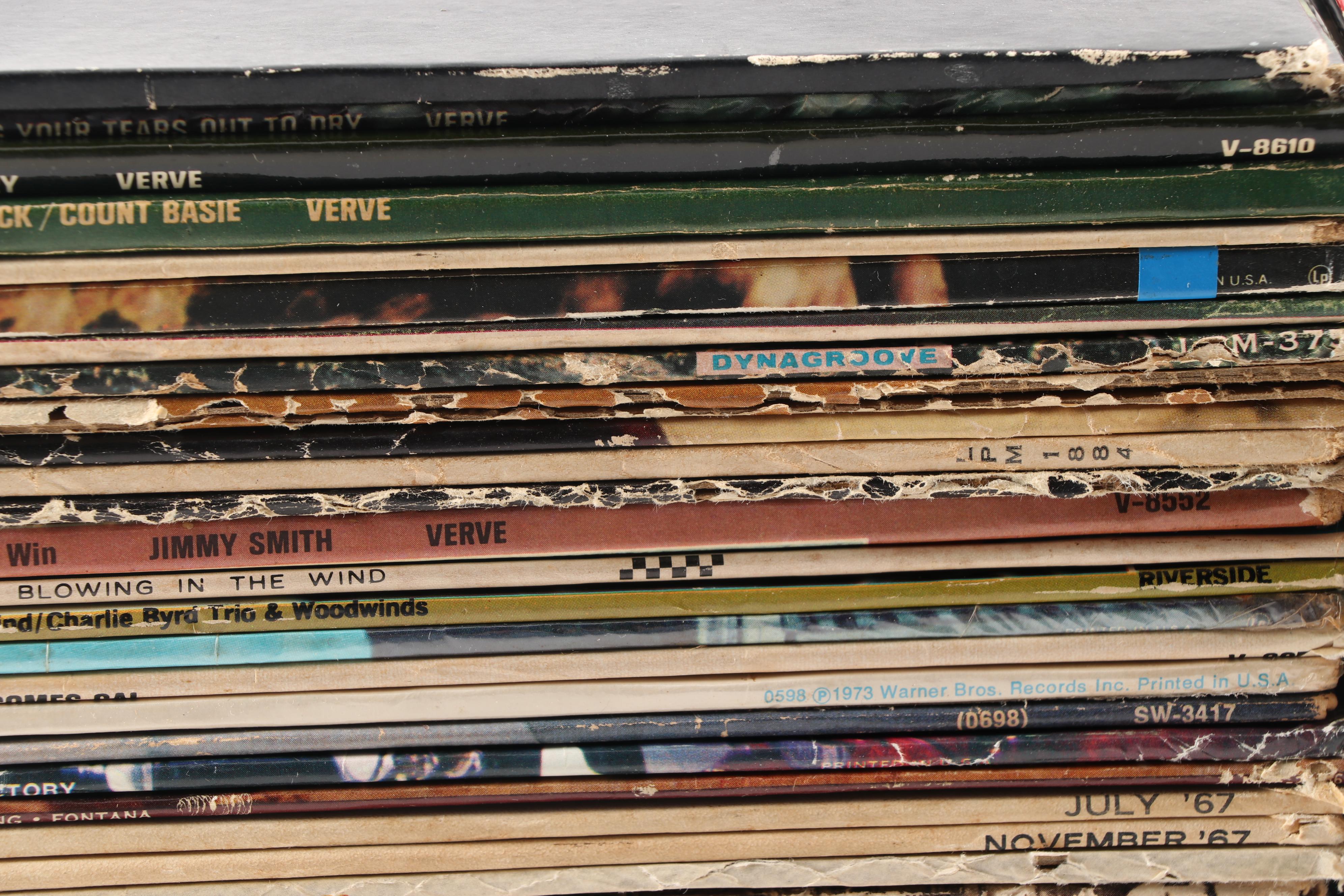 Rock LPs including Meat Loaf, Jimi Hendrix, Elvis, The Doors, and Kiss