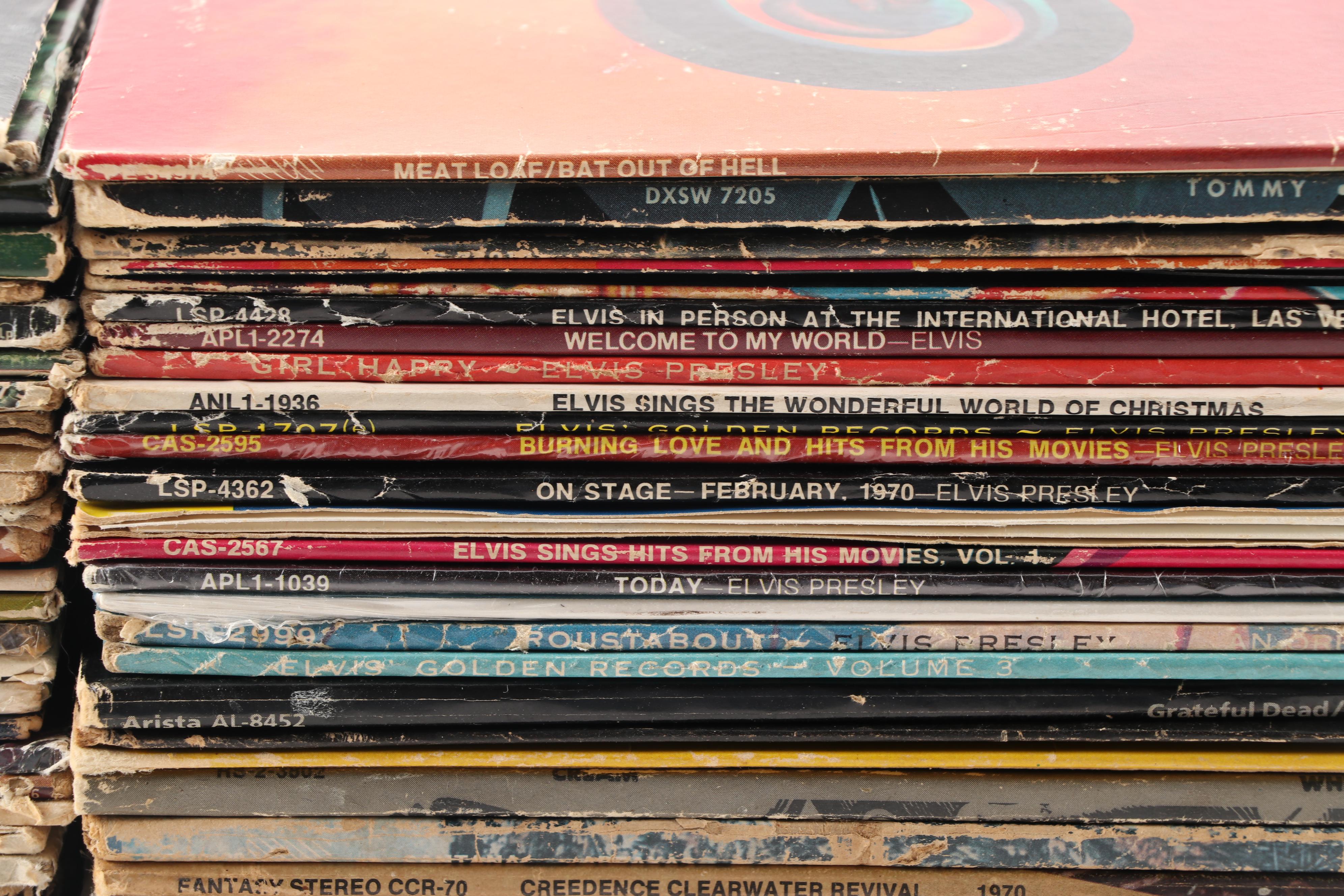 Rock LPs including Meat Loaf, Jimi Hendrix, Elvis, The Doors, and Kiss