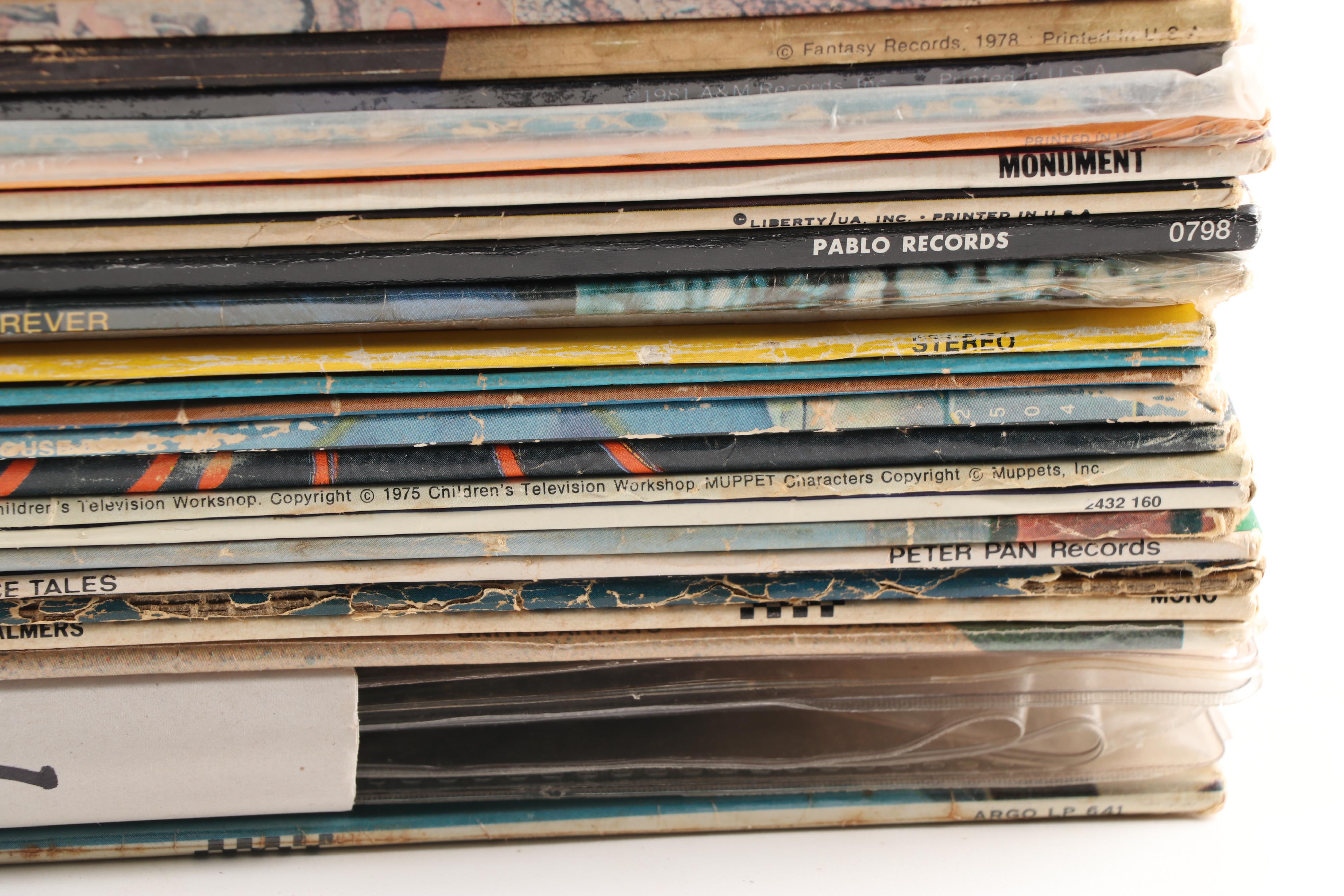 Rock LPs including Meat Loaf, Jimi Hendrix, Elvis, The Doors, and Kiss