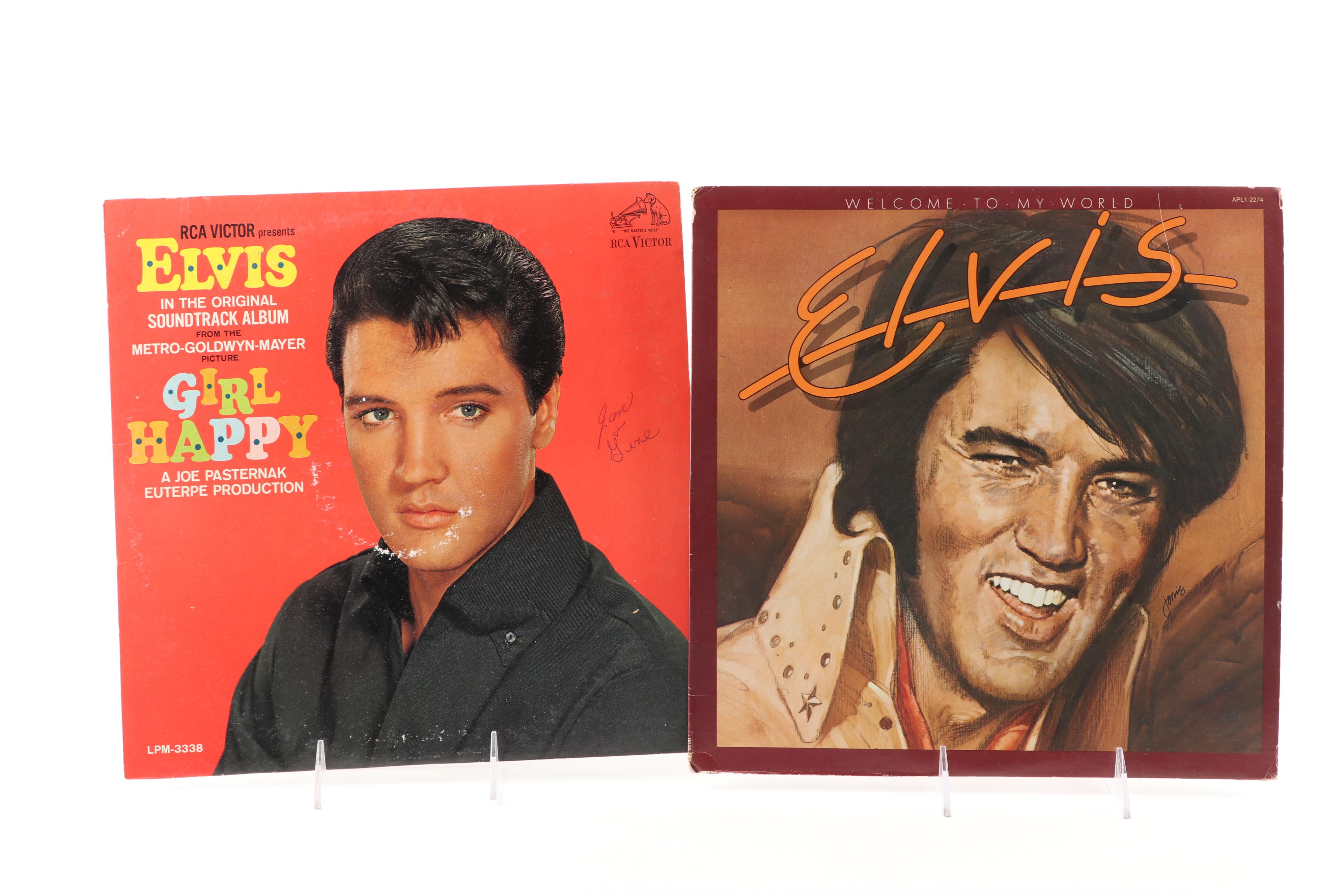 Rock LPs including Meat Loaf, Jimi Hendrix, Elvis, The Doors, and Kiss