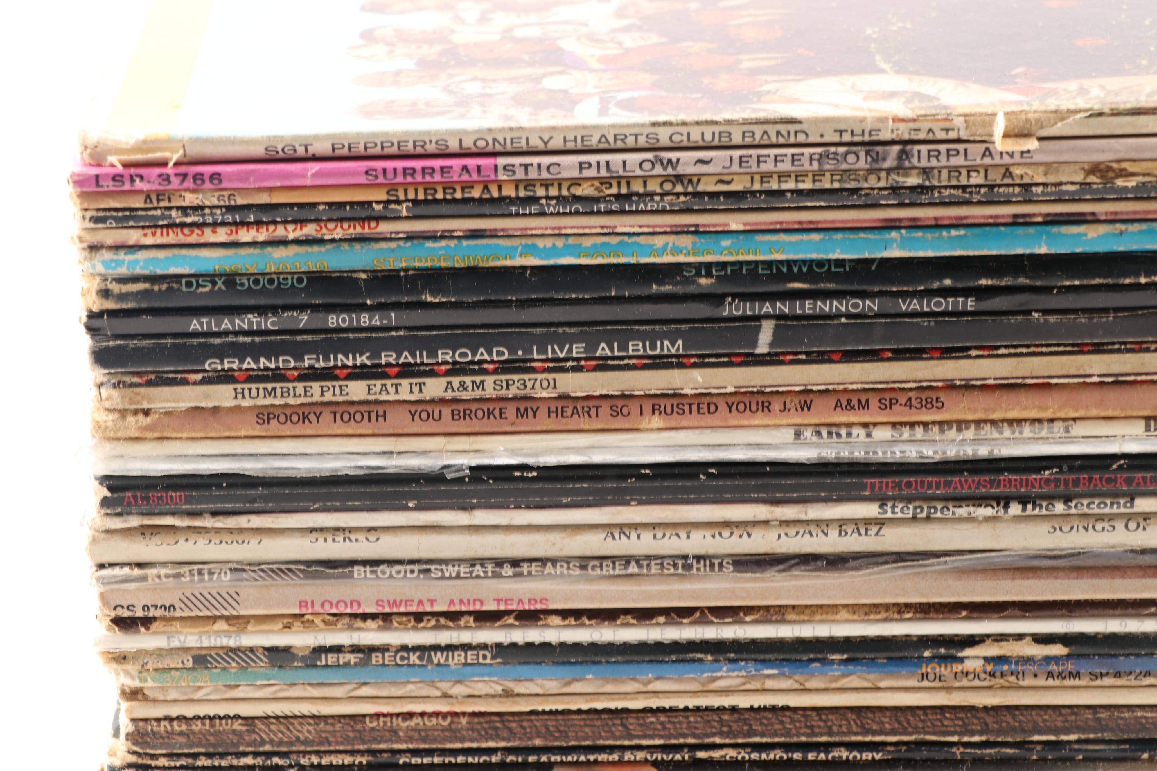 Rock LPs including The Beatles, Jethro Tull, and The Who