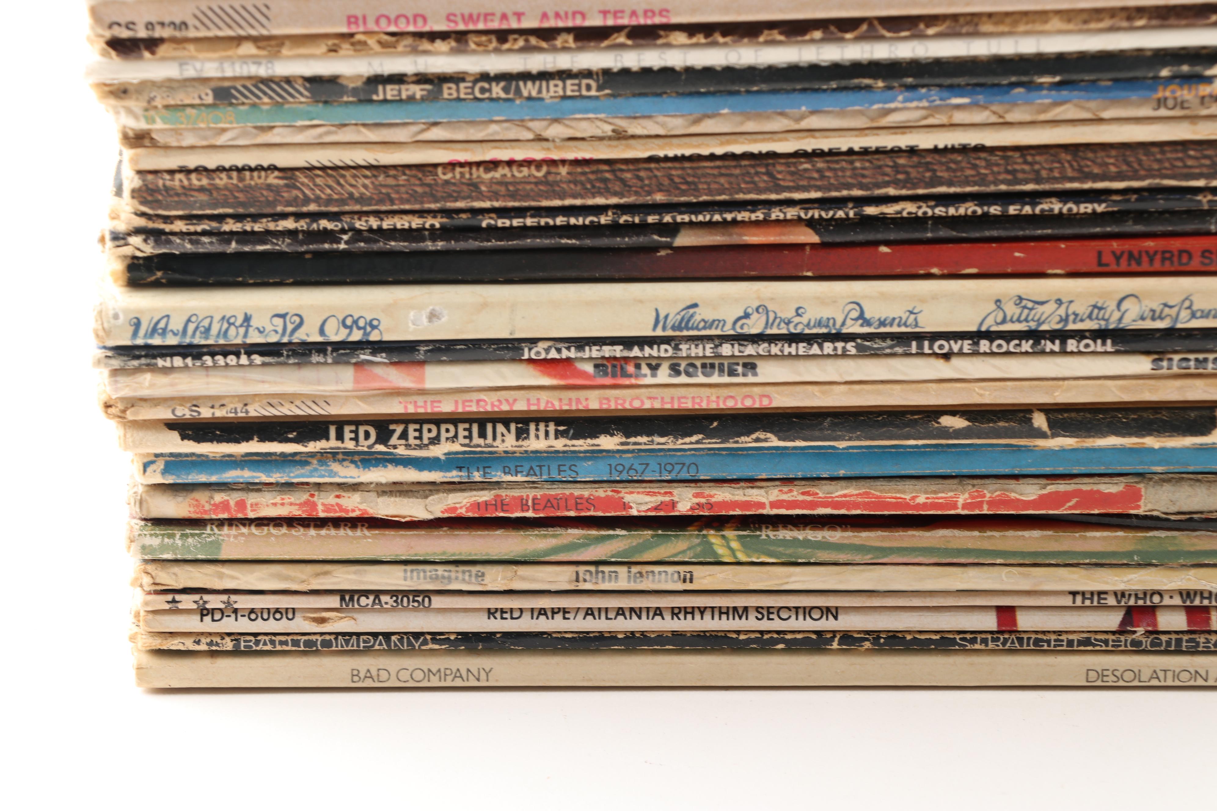Rock LPs including The Beatles, Jethro Tull, and The Who