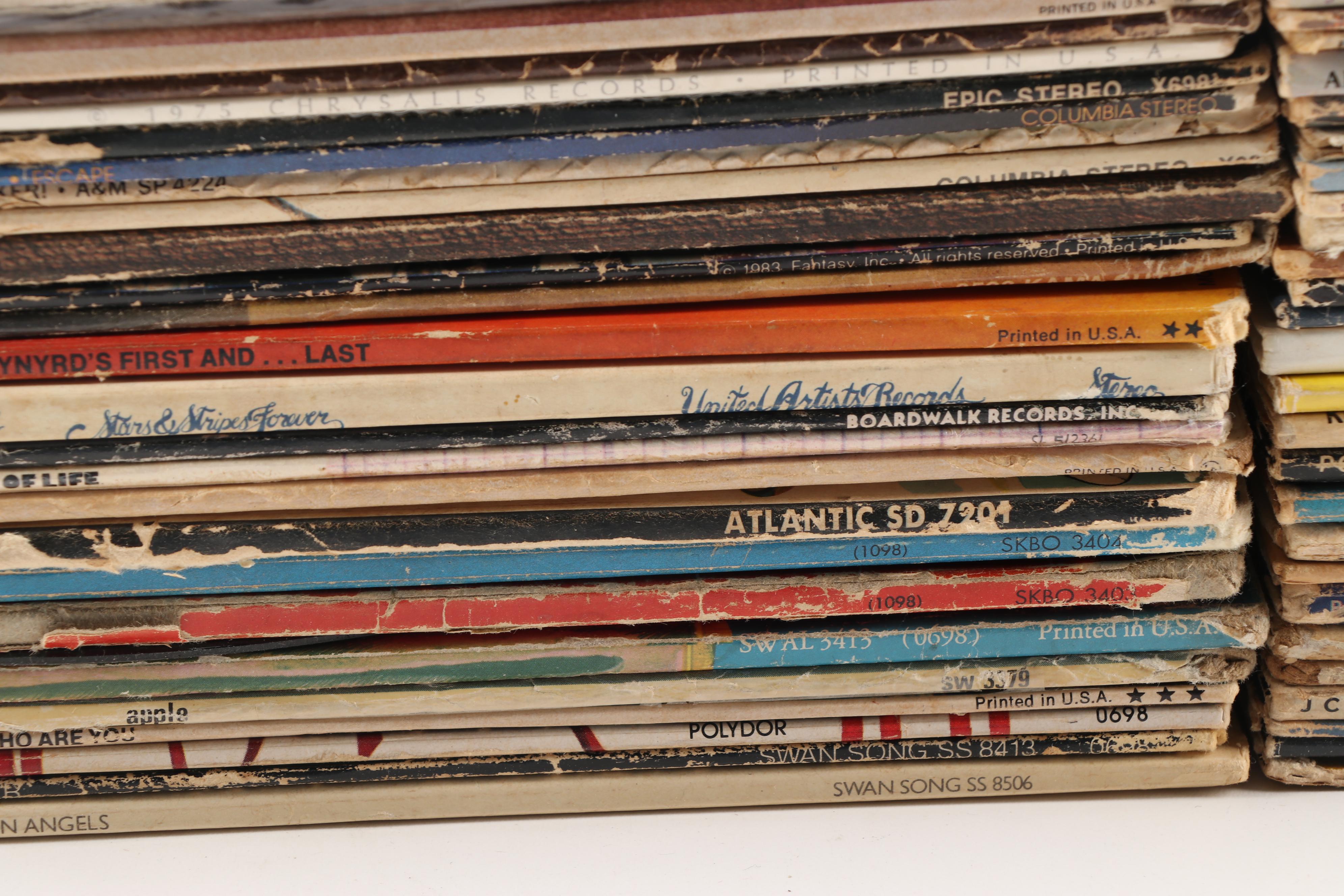 Rock LPs including The Beatles, Jethro Tull, and The Who