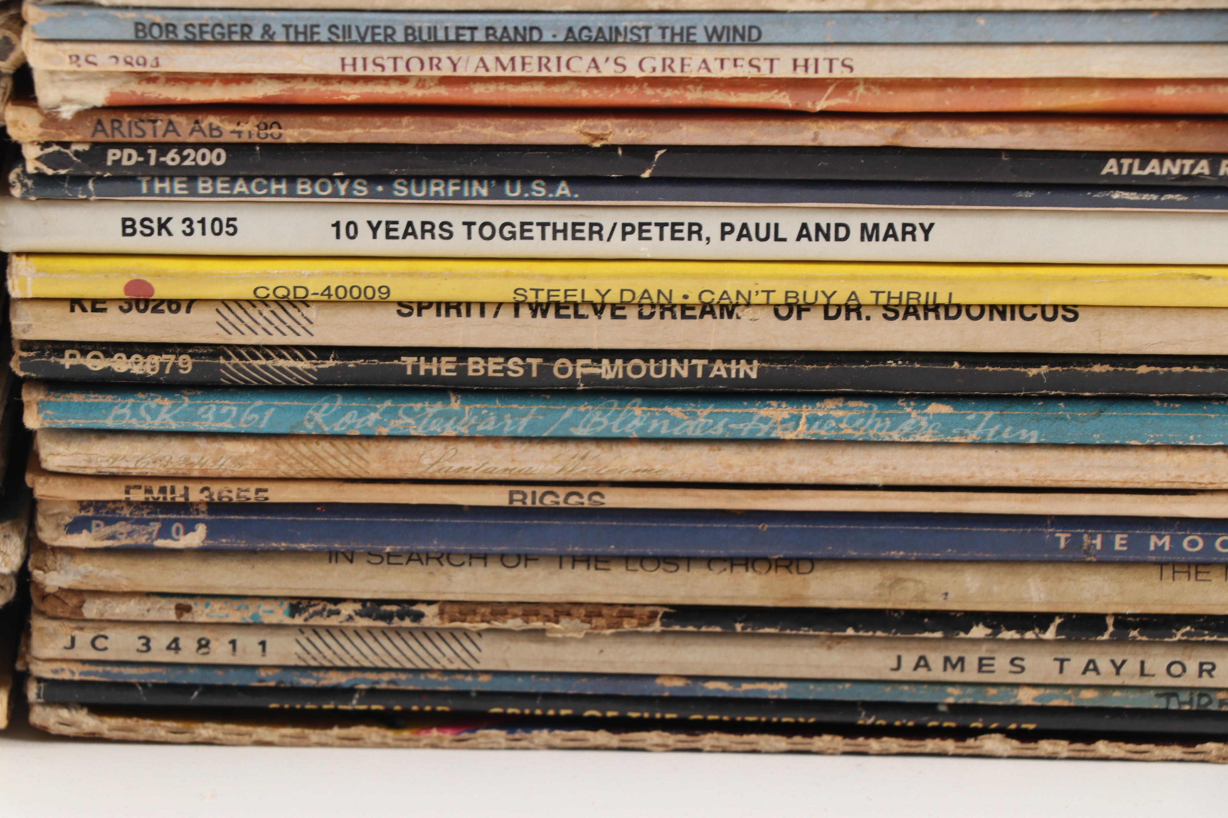 Rock LPs including The Beatles, Jethro Tull, and The Who