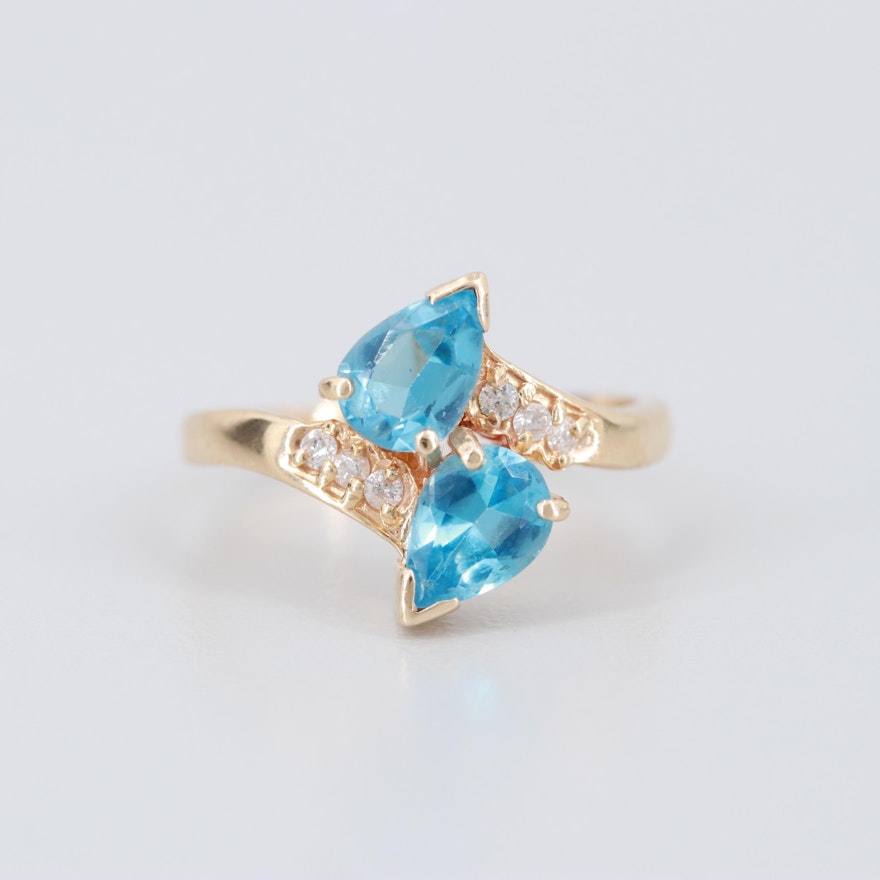 14K Yellow Gold Blue Topaz and Diamond Bypass Ring