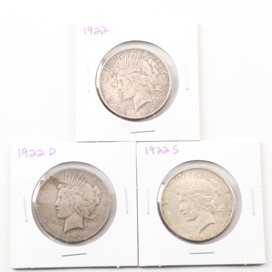 1922, 1922 D and a 1922 S Peace Silver Dollars
