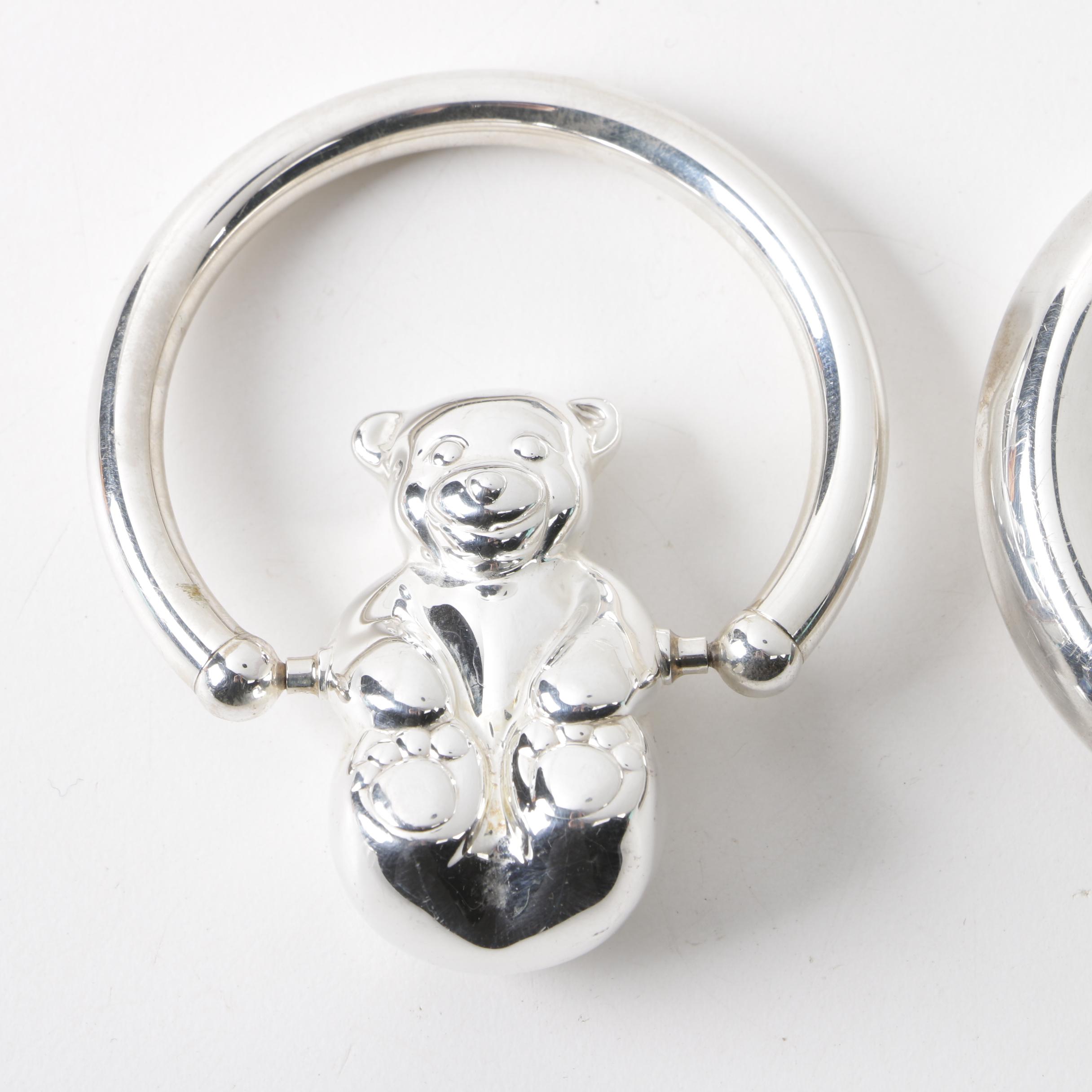 Tiffany & Co. Sterling "Man on the Moon" and "Rolling Swing Bear" Baby Rattles
