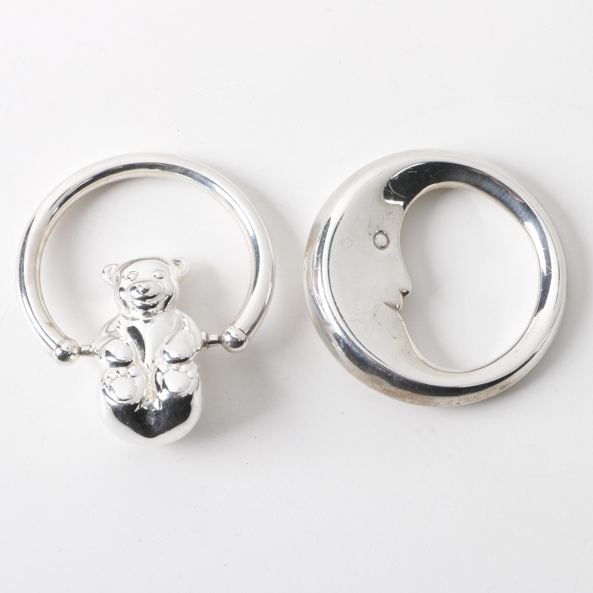 Tiffany & Co. Sterling "Man on the Moon" and "Rolling Swing Bear" Baby Rattles