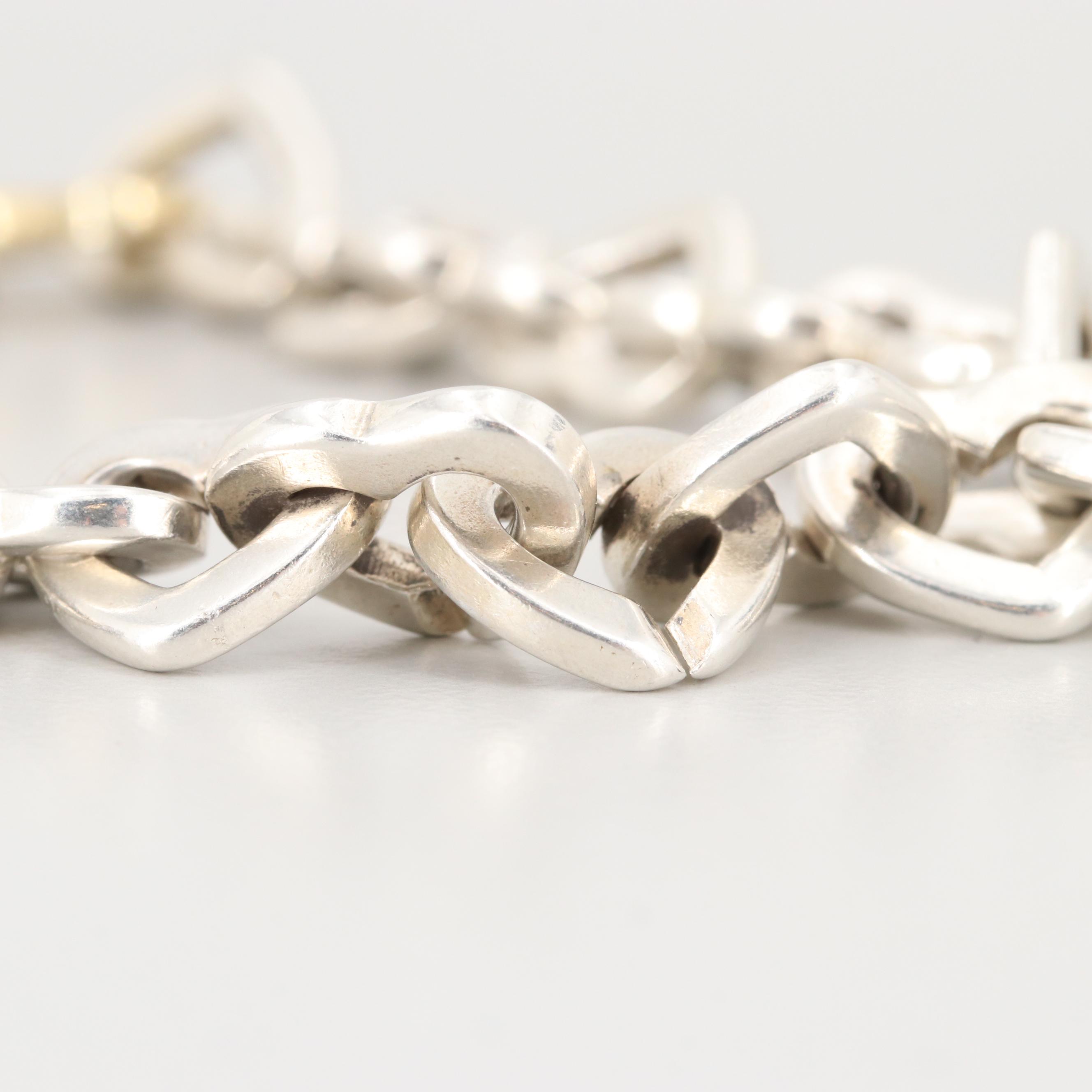Tiffany & Co. Sterling Silver Heart Link Bracelet with 18K Yellow Gold Accent