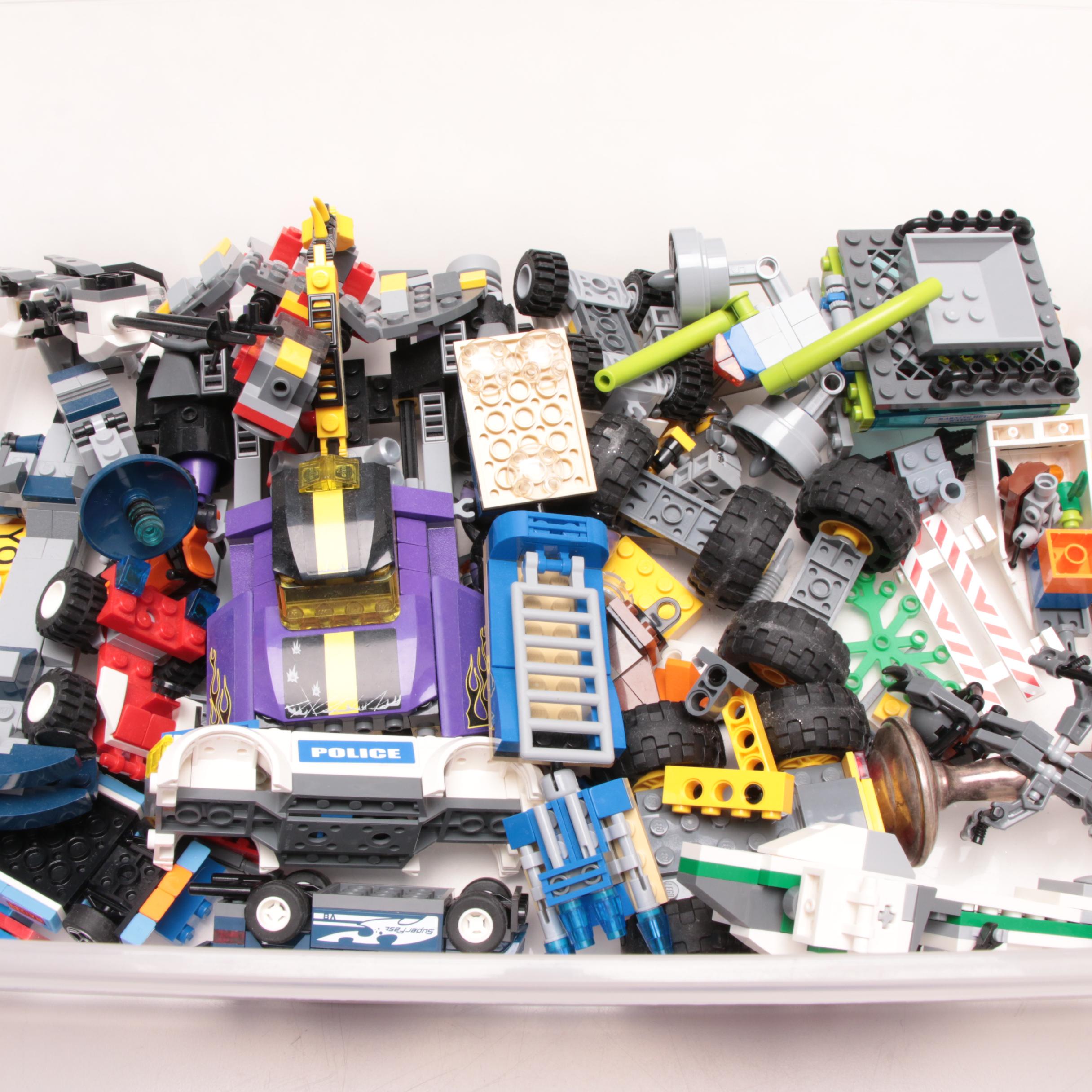 LEGO Building Pieces Including Transport and Construction Vehicles