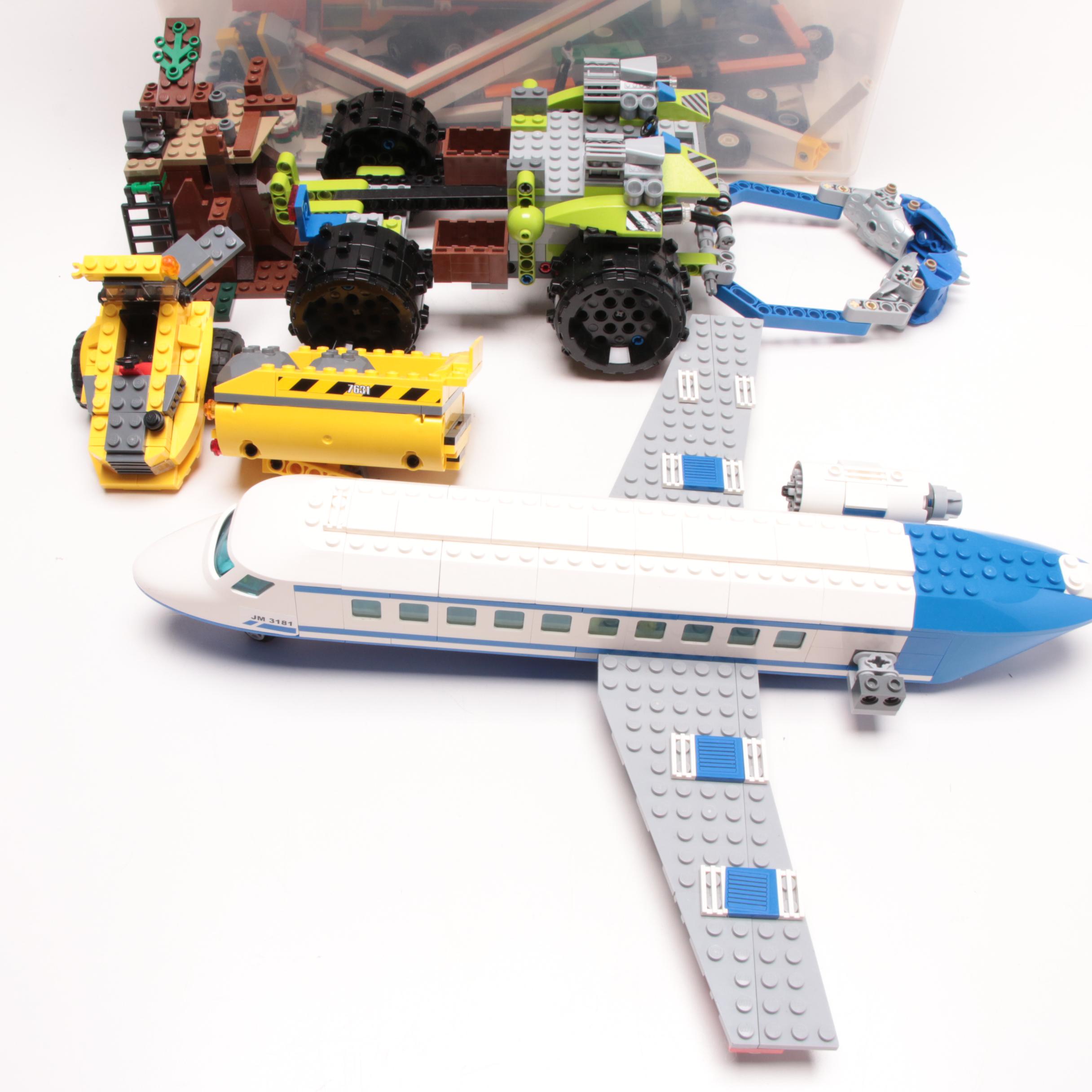 LEGO Building Pieces Including Transport and Construction Vehicles