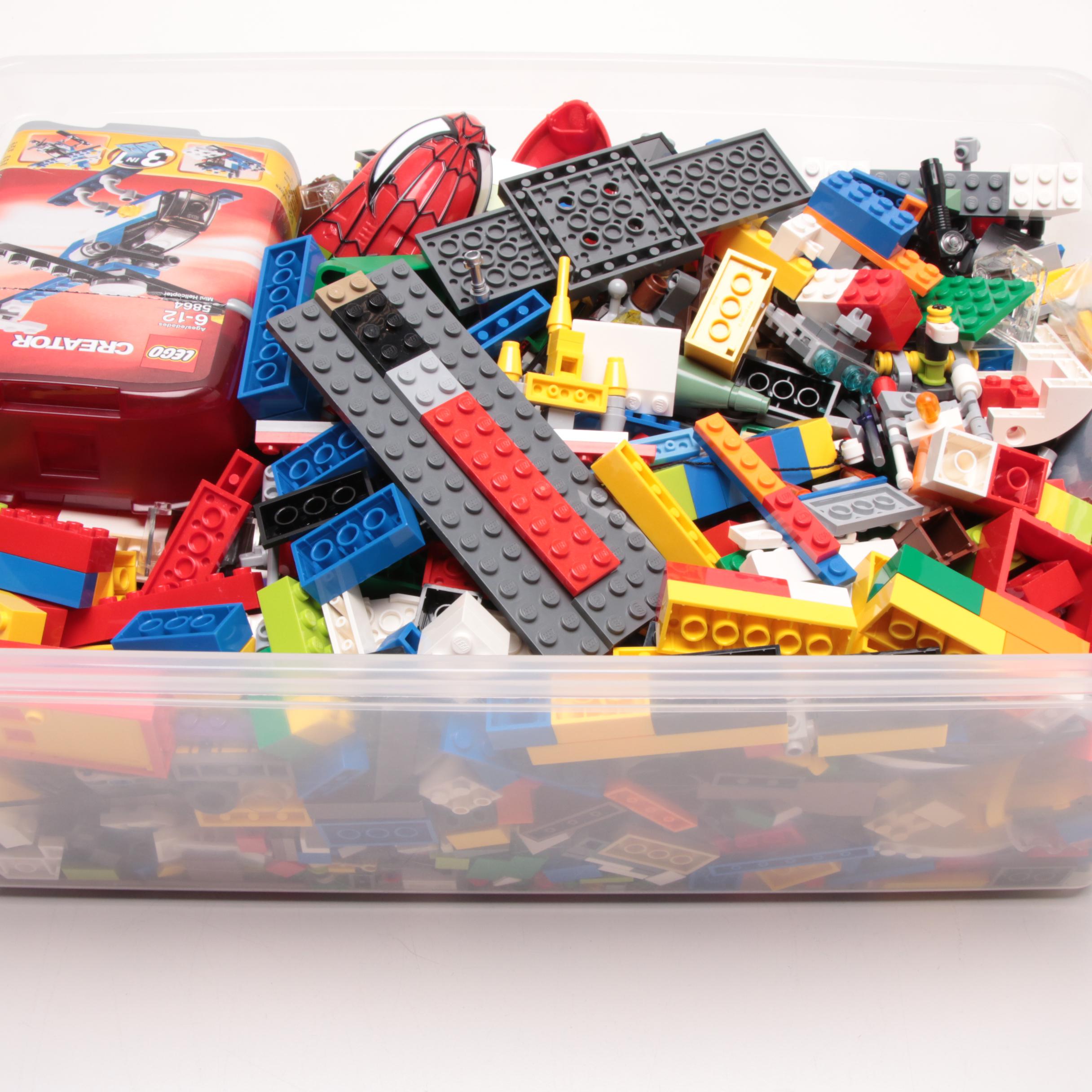 LEGO Building Pieces Including Transport and Construction Vehicles