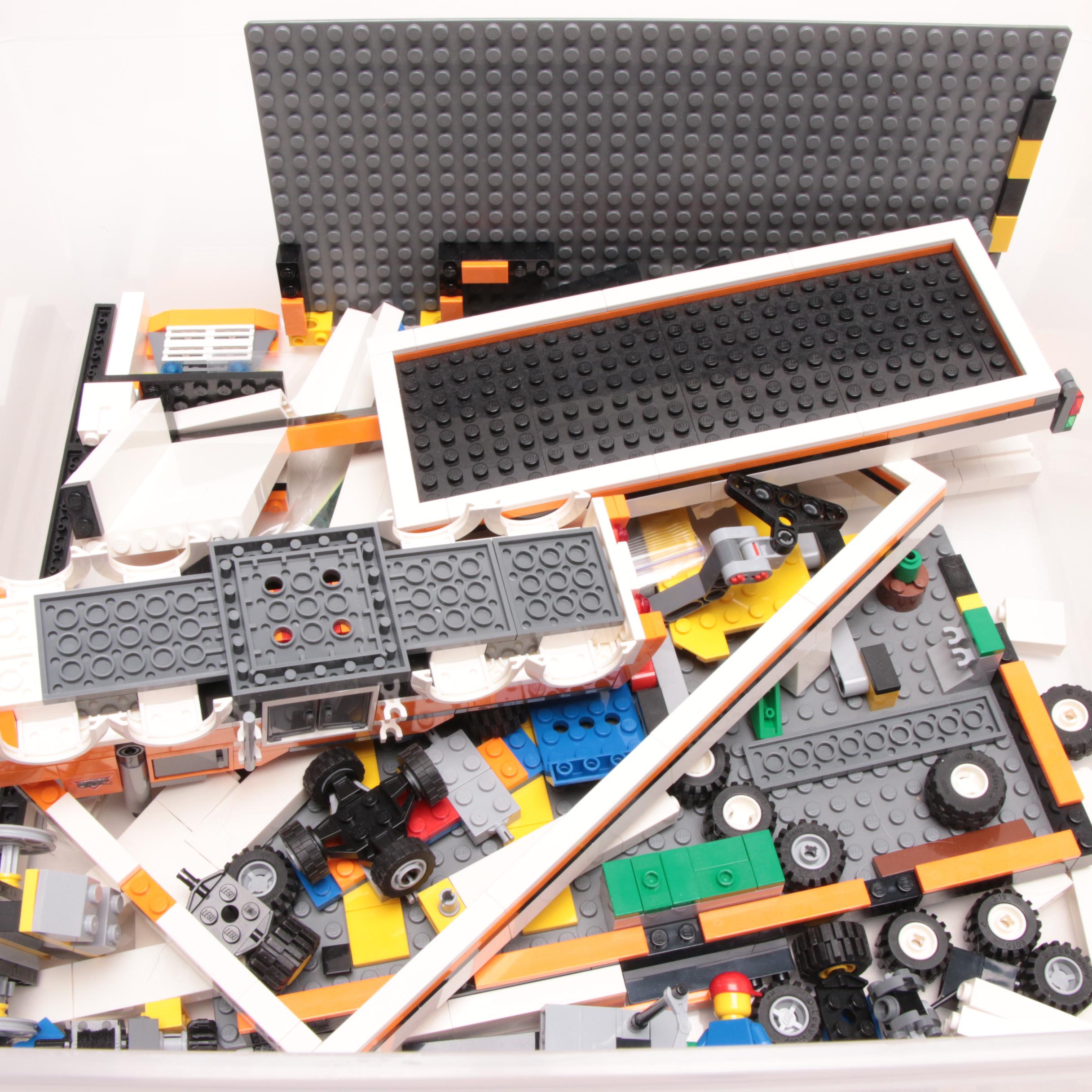 LEGO Building Pieces Including Transport and Construction Vehicles