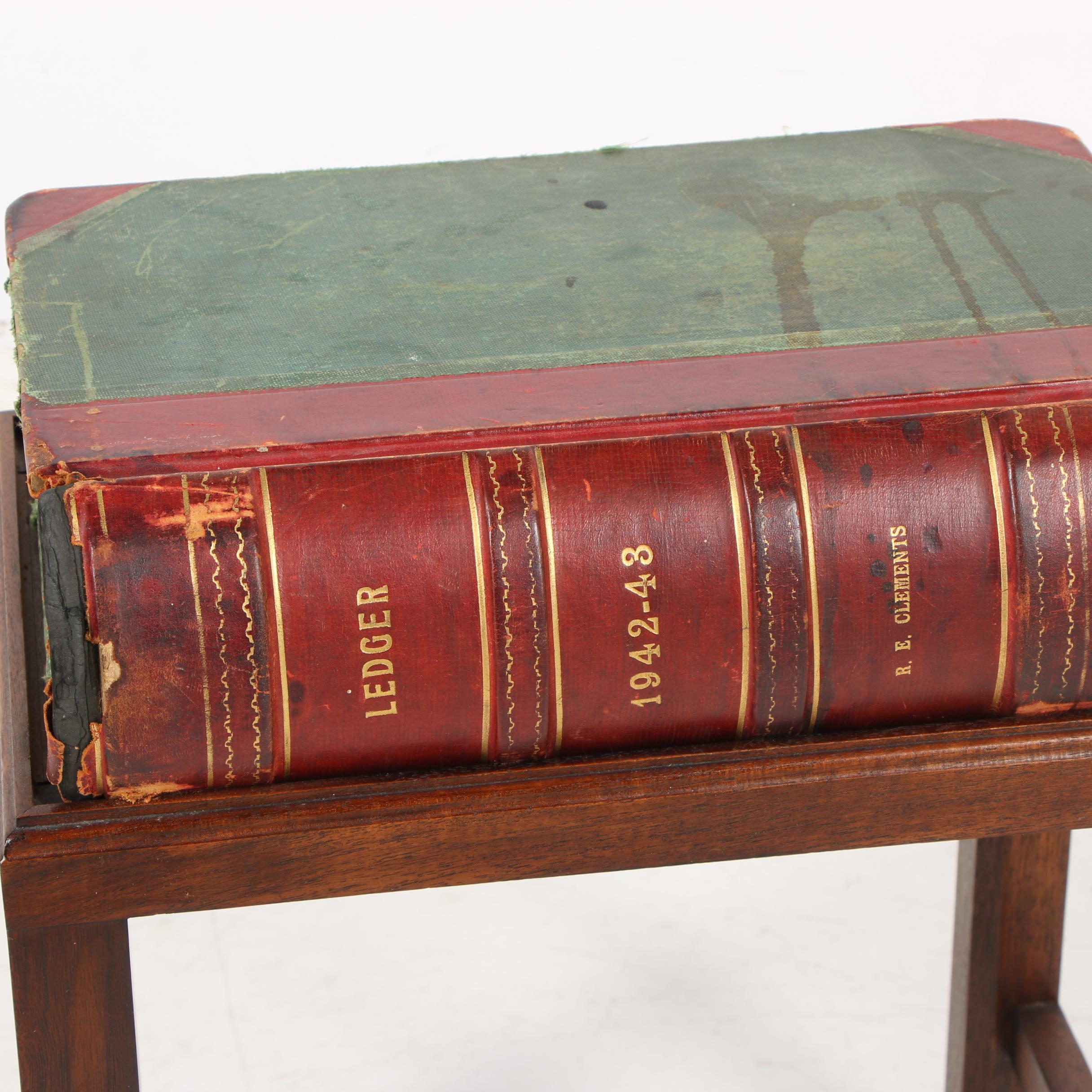 1942-3 Bound Ledger on Wooden Table