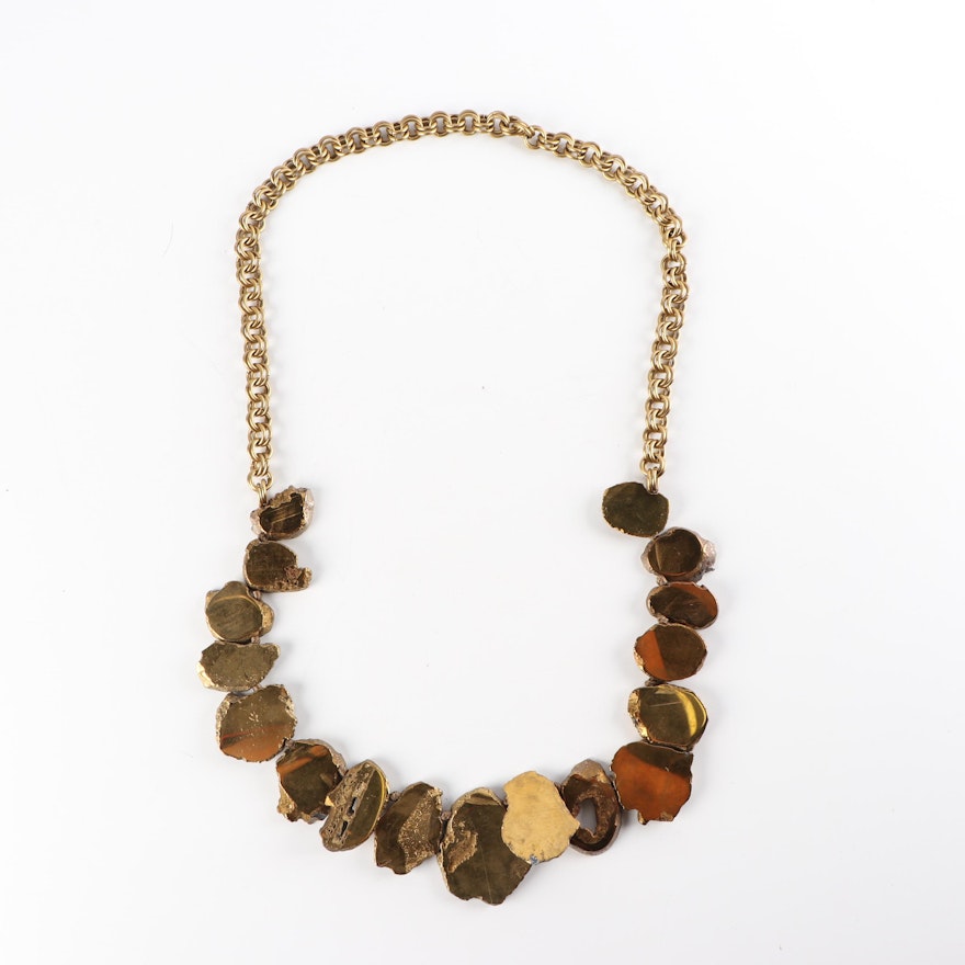 Gold Tone and Metallic Sliced Geode Necklace